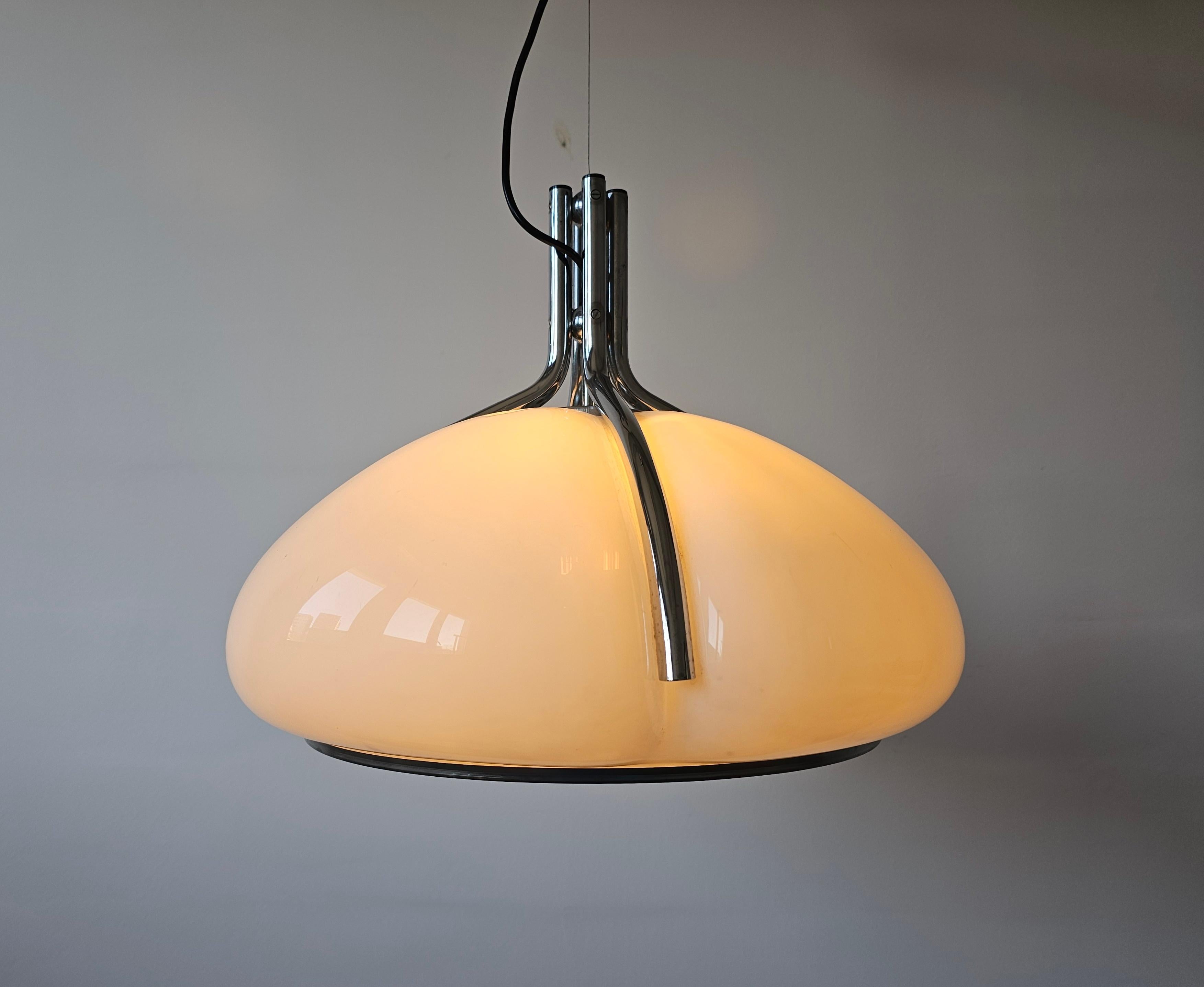 In this listing you will find the iconic and very elegant Mid-Century Modern pendant lamp or hanging light Quadrifoglio in biomorphic shape.

It was designed by Gae Aulenti for Harvey Guzzini in 1960s, Italy, it is an eye catching light