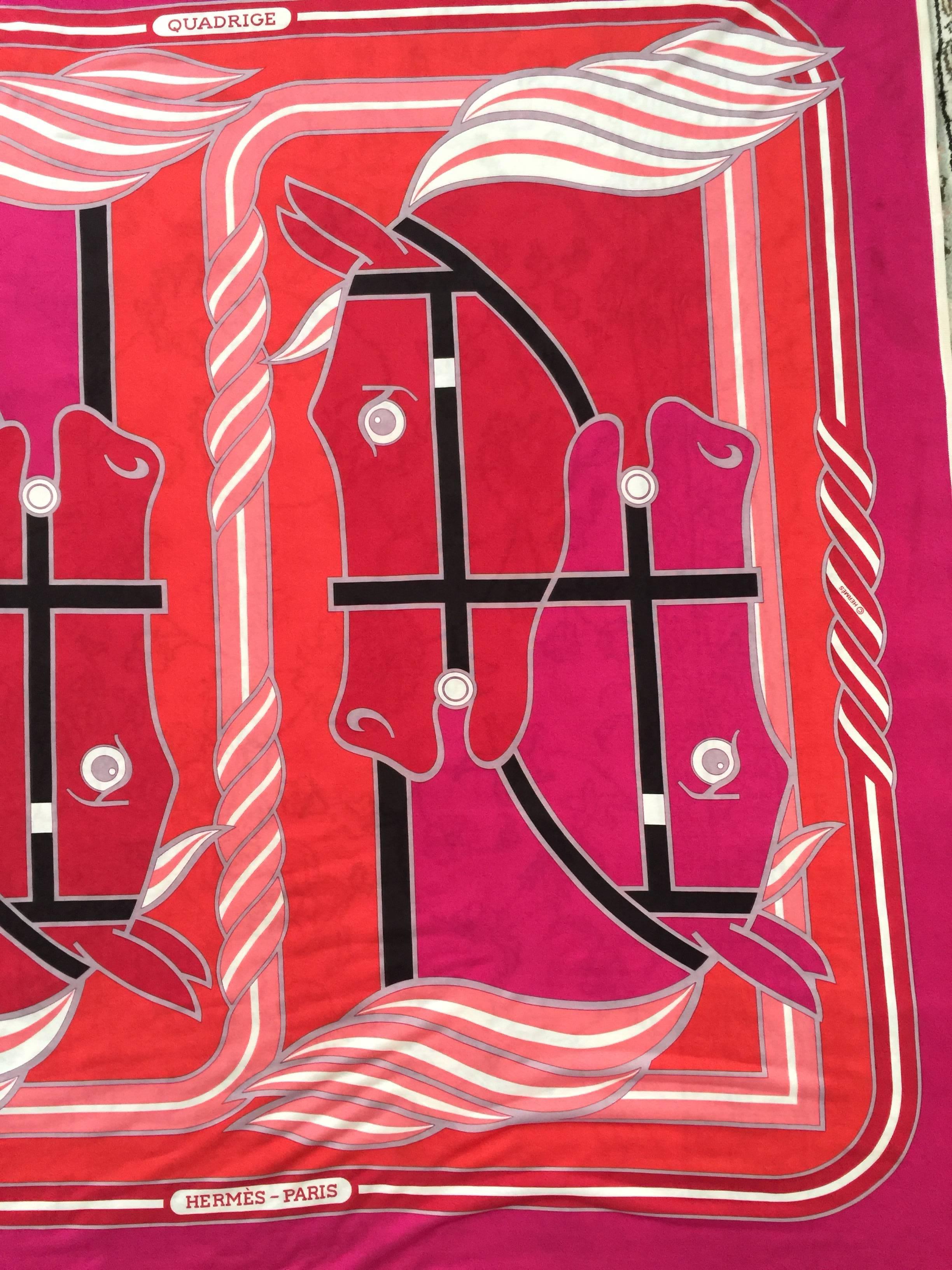 Quadriga is ancient four-horse,two-wheel charriot usually used  
for racing.
This vibrant red and fushia scarf has a fashionable 70's feel and  was designed by Pierre Peron .
The fabric is a jersey 100% silk  and very soft to the touch.....always