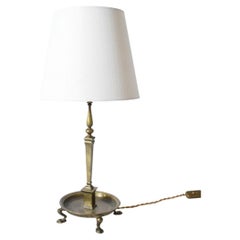 Quadripod lion paws bronze lamp, 1960s.