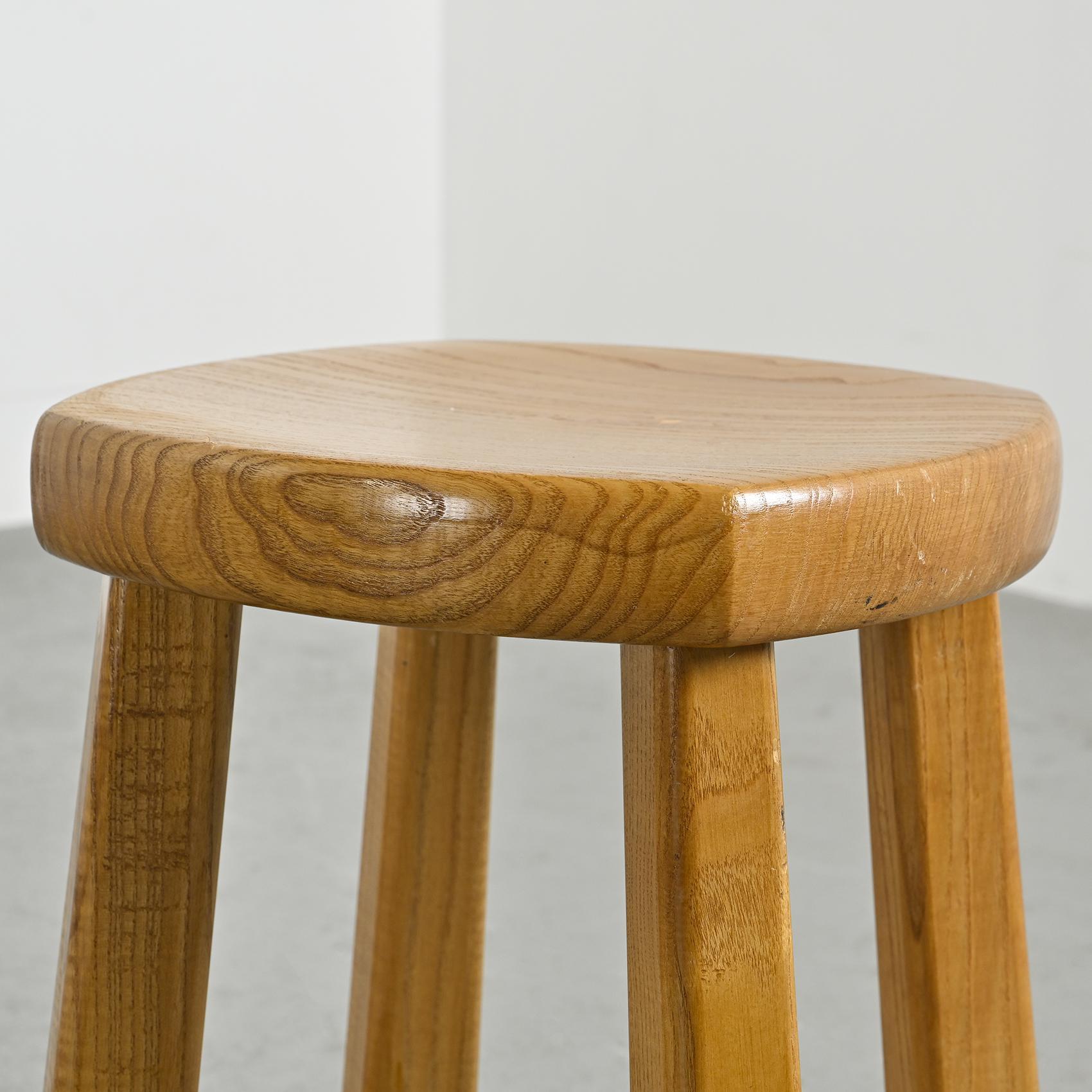 20th Century Quadripod stool in solid elm, France, circa 1960 For Sale