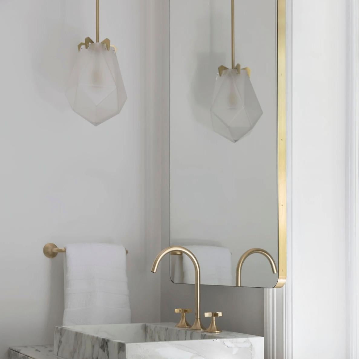 mirror suspended from ceiling