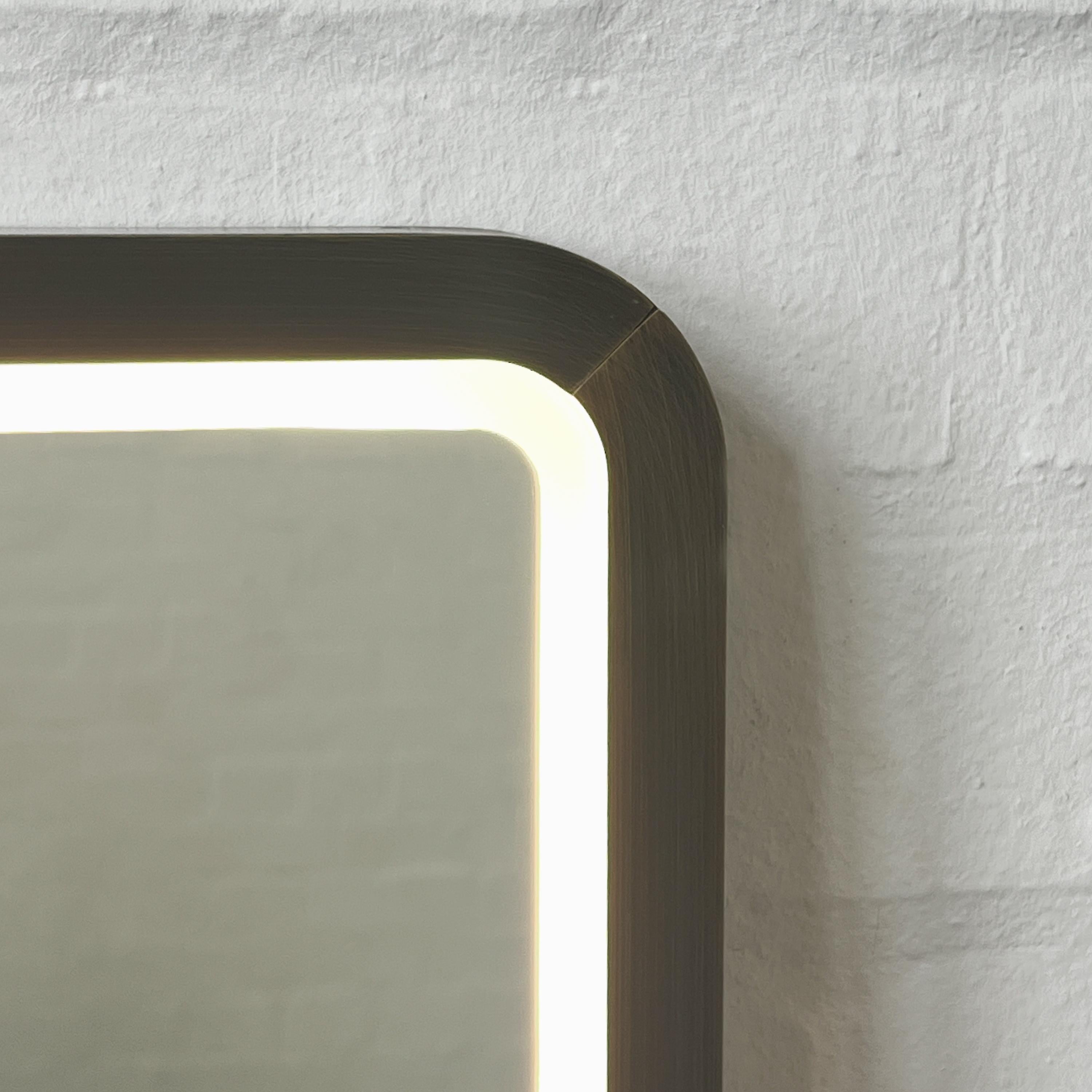 British Quadris Front Illuminated Rectangular Mirror with Bronze Patina Mitred Frame For Sale