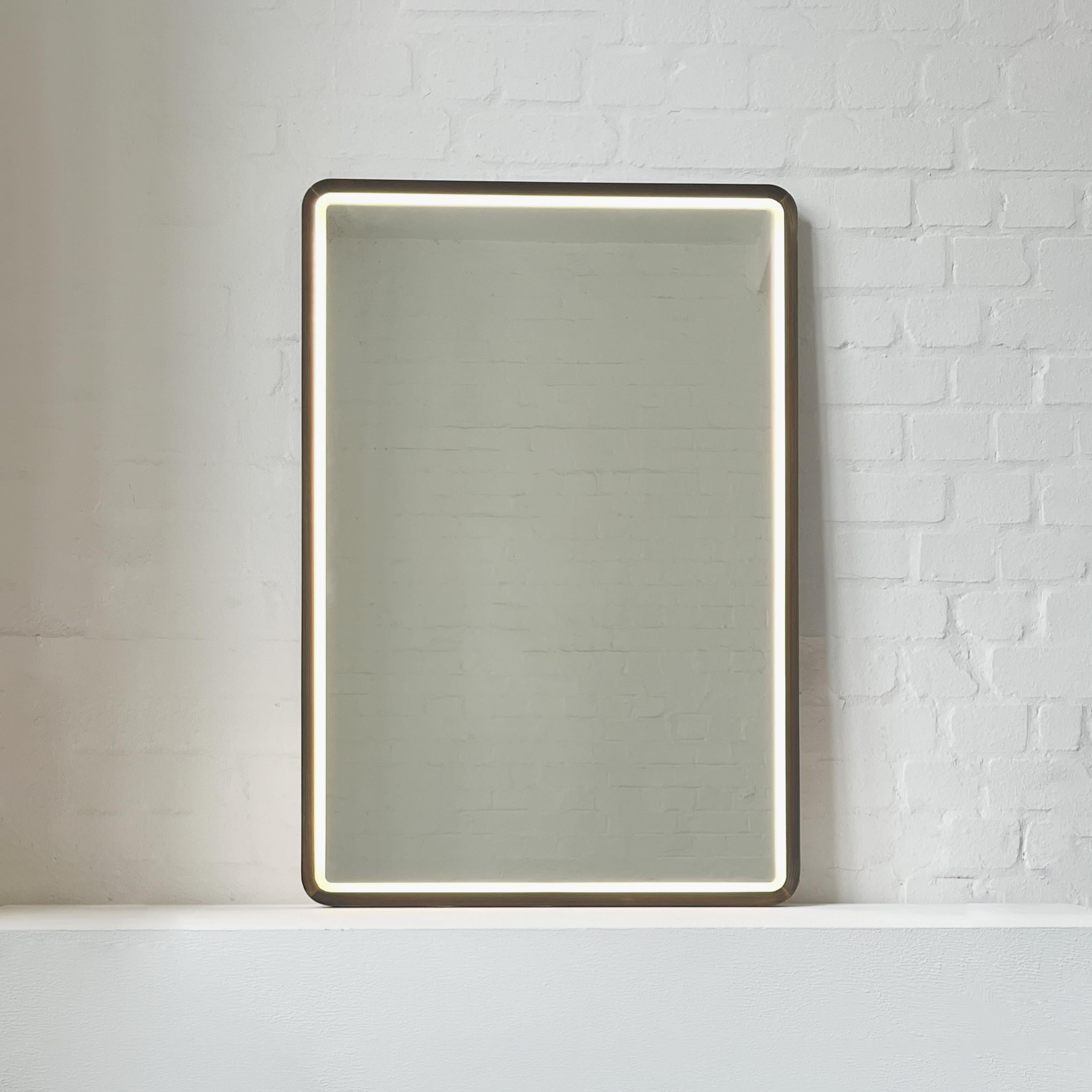 Patinated Quadris Front Illuminated Rectangular Mirror with Bronze Patina Mitred Frame For Sale