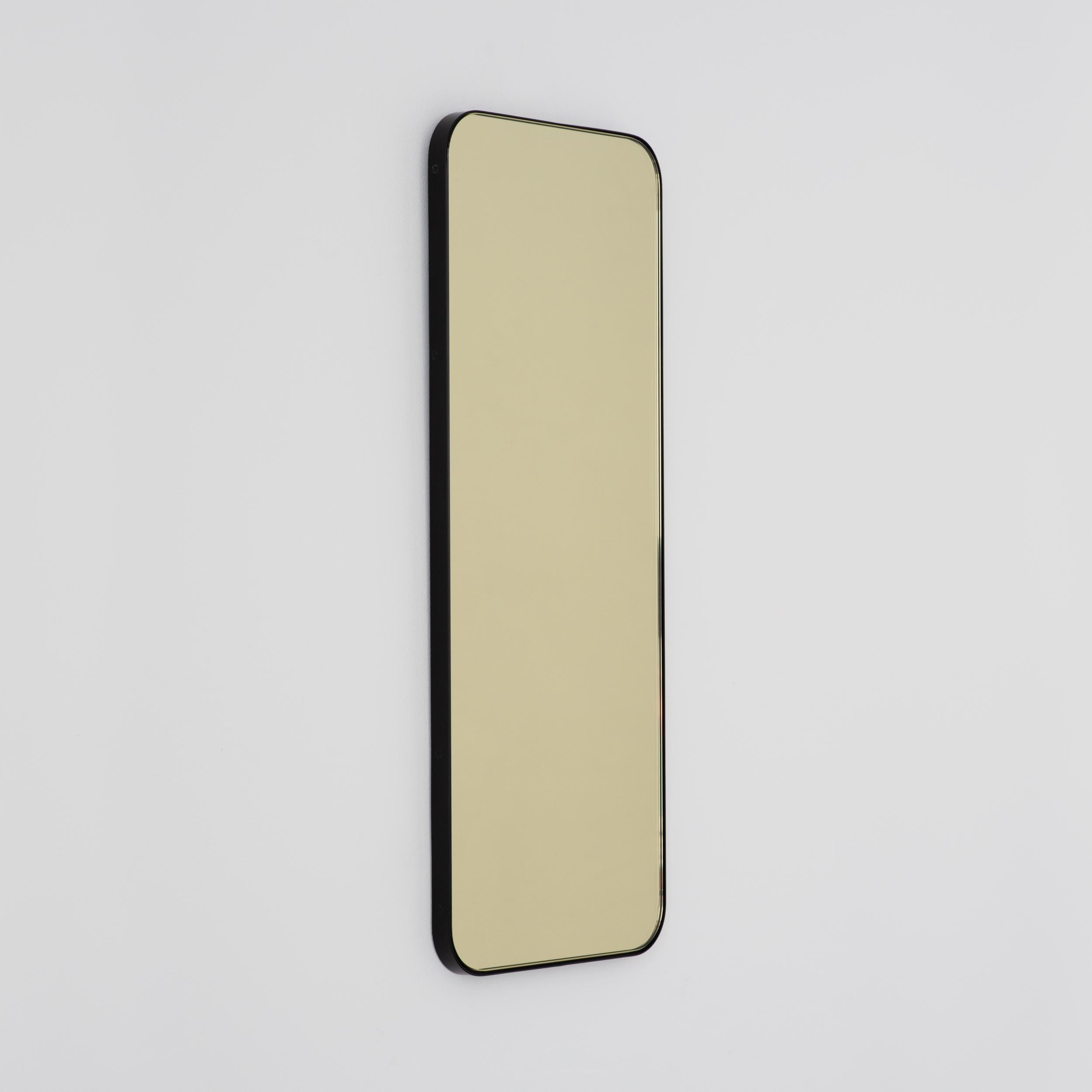 Poudré Quadris Miroir rectangulaire contemporain teinté d'or avec un cadre noir, grand en vente