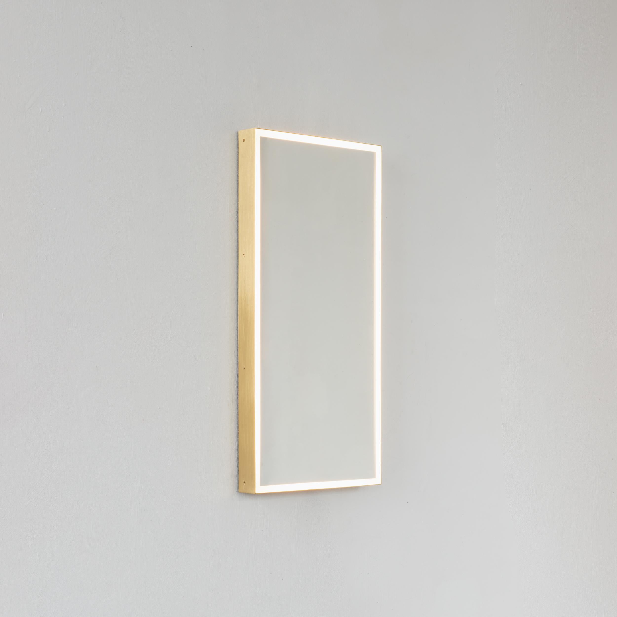 Timeless front illuminated Quadris™ rectangular mirror with square corners and a solid brass frame. Designed and handcrafted in London, UK. This mirror is fully customisable to suit the specific requirements of each interior.

Standard Illumination.