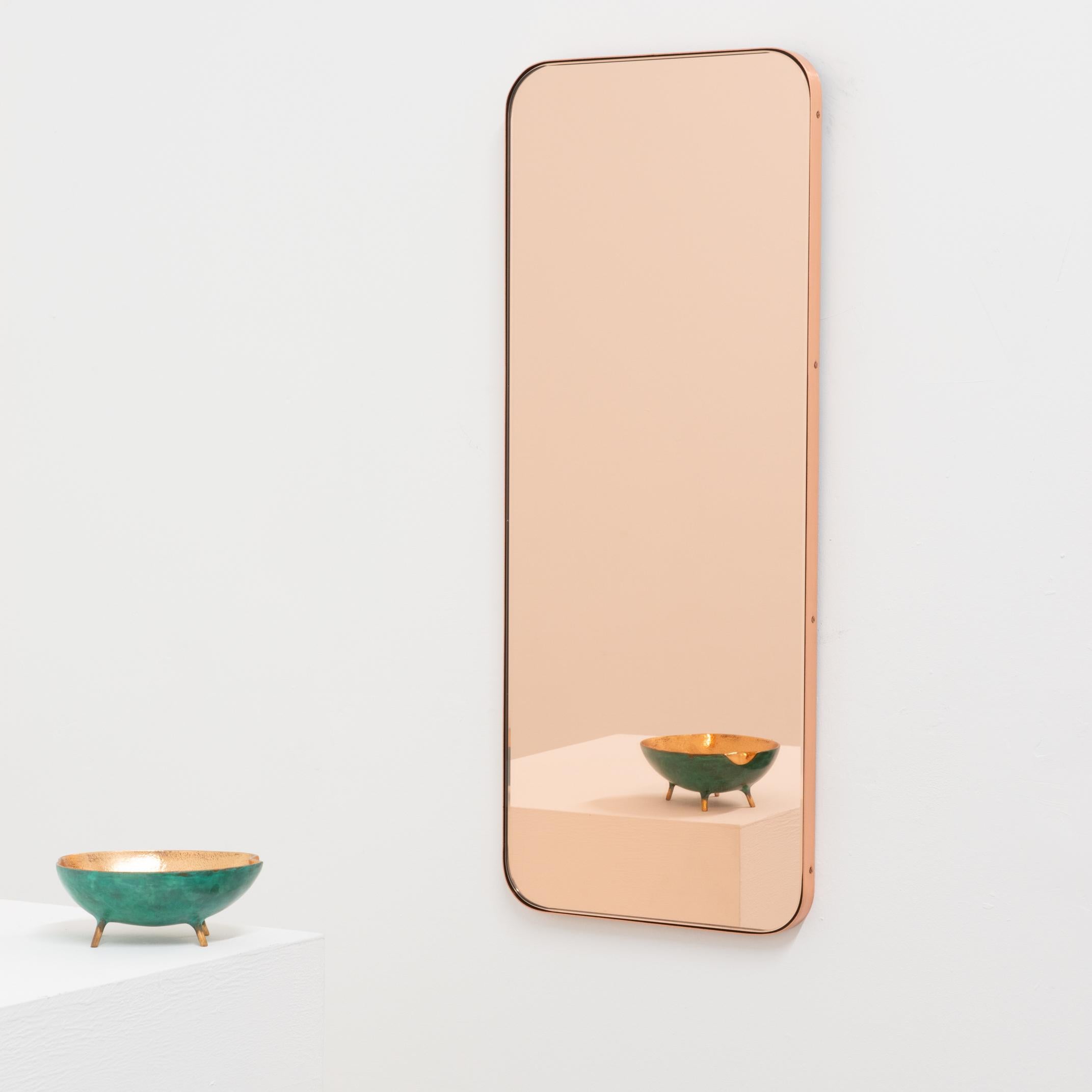 Minimalist rectangular mirror with an elegant slim brushed copper frame. The detailing and finish, including visible copper plated screws, emphasise the crafty and quality feel of the mirror, a true signature of our brand. Designed and handcrafted