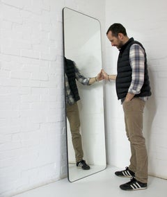 Quadris Wall Leaning Rectangular Mirror with Patina Frame, Oversized