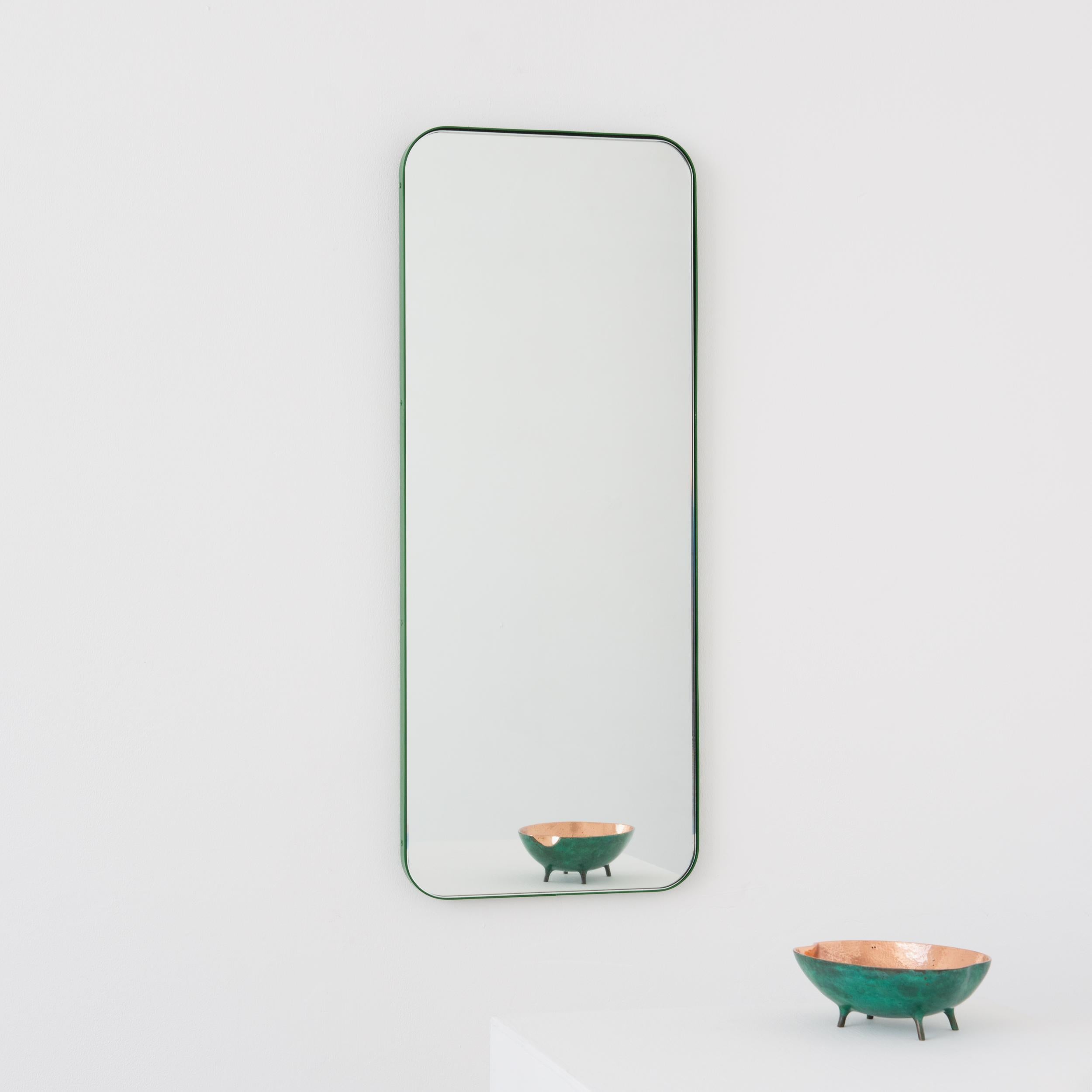 Modern rectangular mirror with an elegant green frame. Part of the charming Quadris collection, designed and handcrafted in London, UK. 

Supplied fitted with a specialist z-bar for an easy installation. A split batten hanging system to fit the