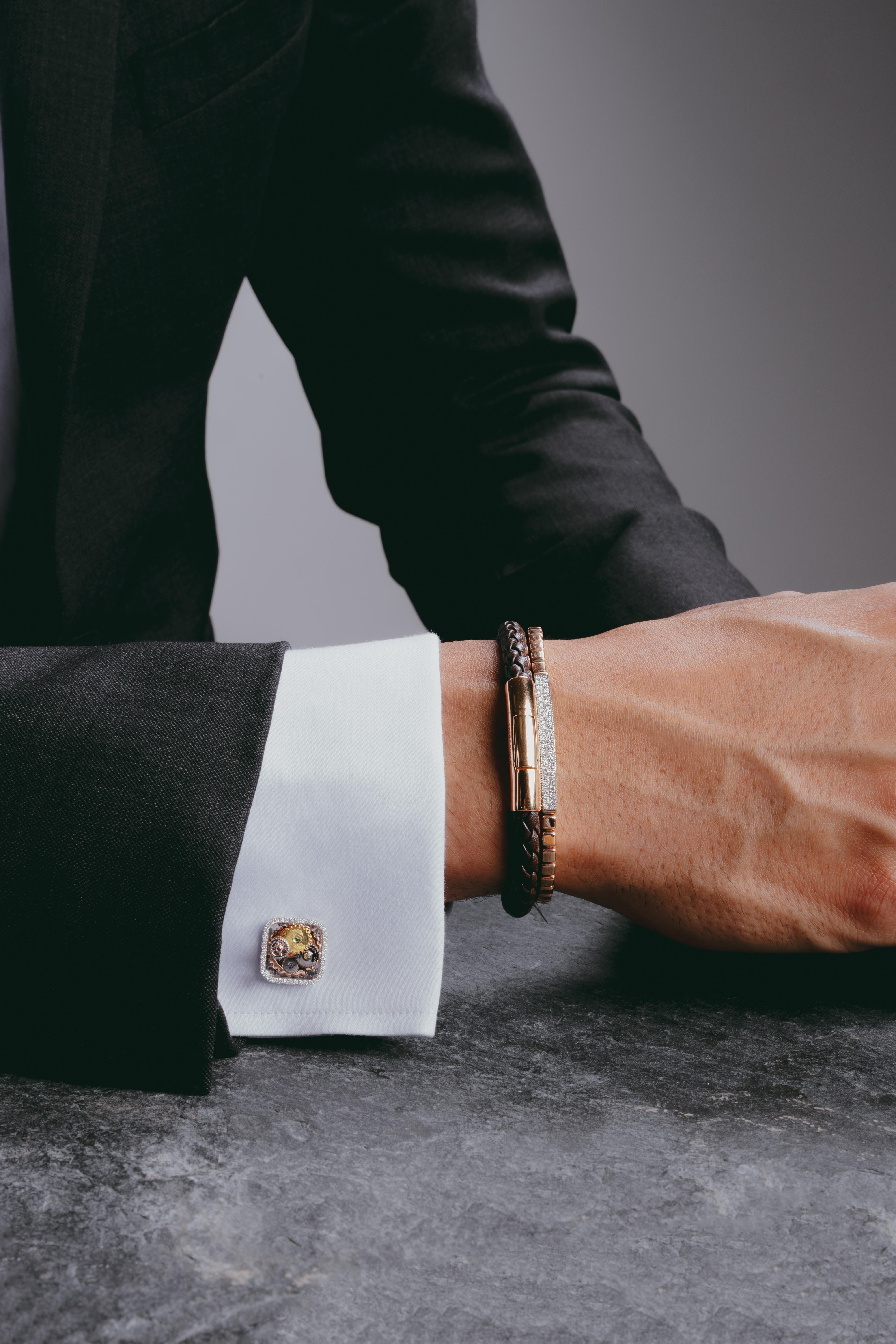 You simply can’t beat the sheer luxury and elegance of diamonds, and this beautifully handcrafted men’s bracelet proves it. The inner elastic is concealed by the 18K rose gold inner tube, and the bracelet's central bar is pave set with 120 white