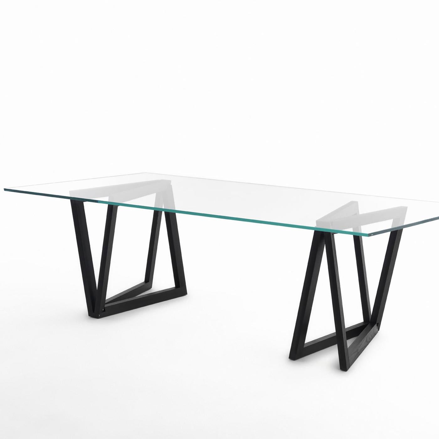 This dining table is a sculptural objet d'art designed by Dror. A unique and innovative piece of functional decor, it comprises two metal legs composed of two L shapes intersecting each other, skillfully cut and combined to create robust and