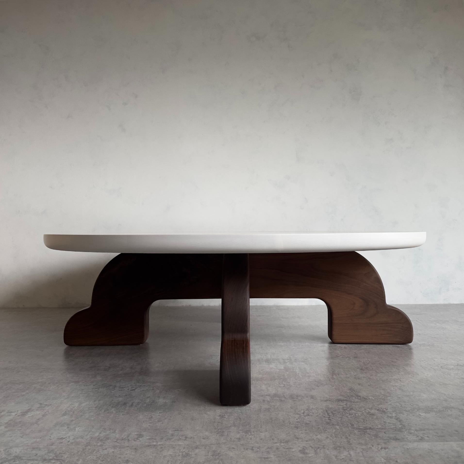 Our Quadruped coffee table is made from solid walnut, with a solid whitened maple top. Inspired by Greek mythology involving Sciapods. A race of monopoded people who used their large foot to shade themselves from the sun. Can be ordered together