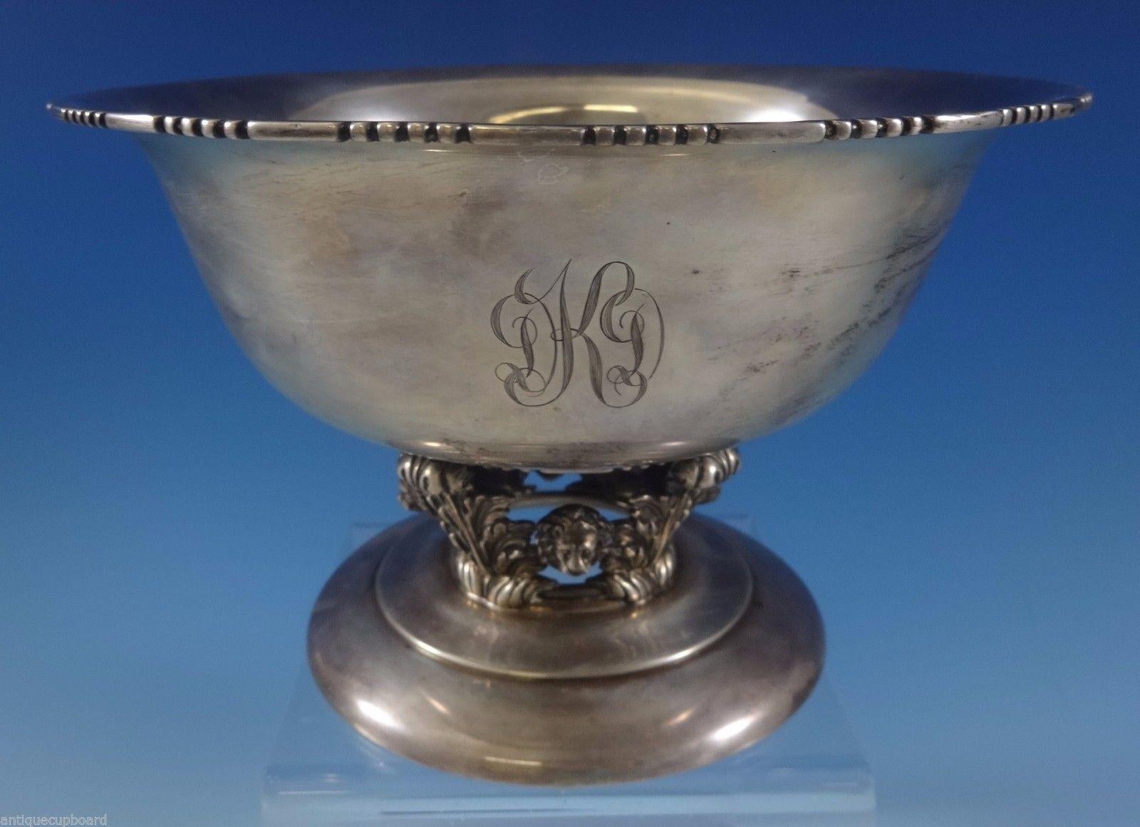 Quaker Silver Co.

This exquisite sterling silver centerpiece bowl was made by Quaker Silver Co. of Massachusetts circa 1926-59, and then became part of Gorham. The bowl has a pedestal base with acanthus leaves and 3-D lion's head. It has a DKD