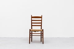 Sedia da pranzo singola con schienale a scaletta in stile Quaker con seduta in giunco e ripiano per la Bibbia