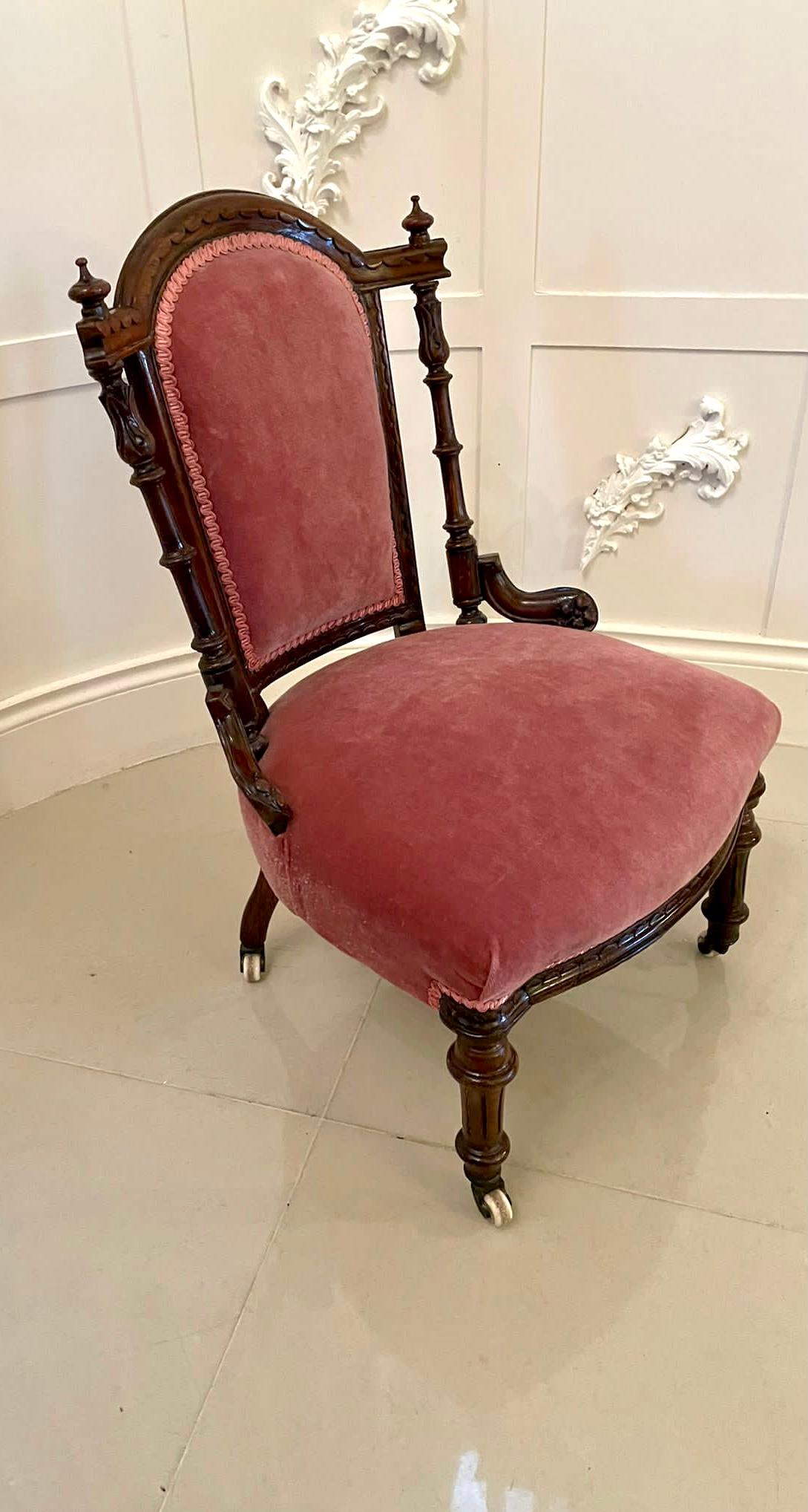 Quality antique Victorian walnut carved ladies chair having a quality solid carved walnut back with lovely shaped turned carved supports and raised on turned reeded legs to the front, out swept back legs with original castors.

We are able to