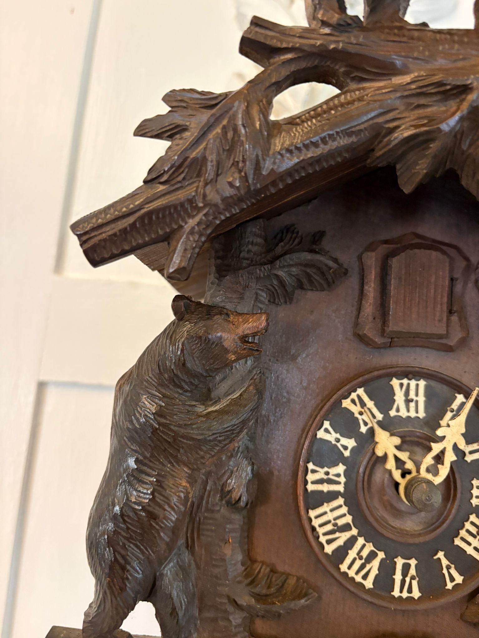 Quality Antique Black Forest Carved Bear Cuckoo Clock For Sale at 1stDibs