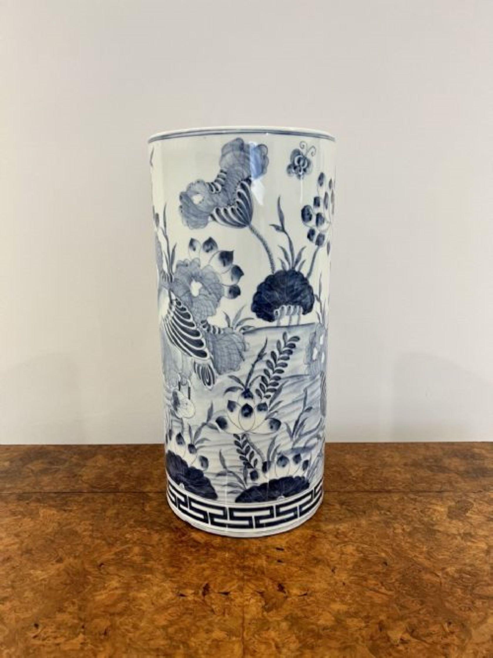 Quality antique blue and white Chinese stick stand having a tall circular quality Chinese stick stand with wonderful decoration in blue and white colours. 