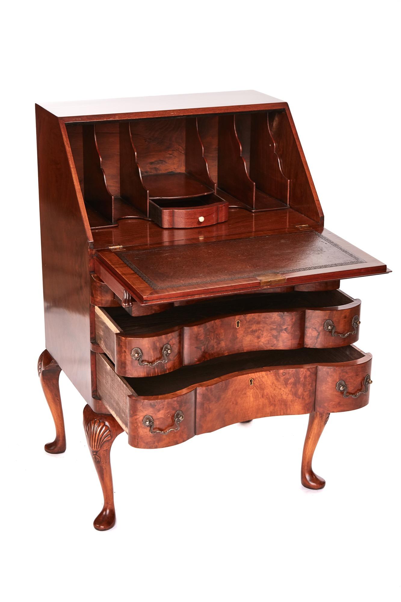 Quality Antique Burr Walnut Bureau with a burr walnut fall opening to reveal a fitted shaped interior, 3 long shaped burr walnut drawers with original handles standing on carved shaped cabriole legs with pad feet. Lovely colour and condition.
H: