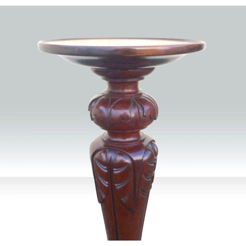 Quality Antique carved mahogany pedestal Torchere

Measures: 110cms high x 36cms diameter.
(43.25ins x 14ins)
Top tray 30.5cms diameter.

Declaration: This item is antique. The date of manufacture has been declared as
