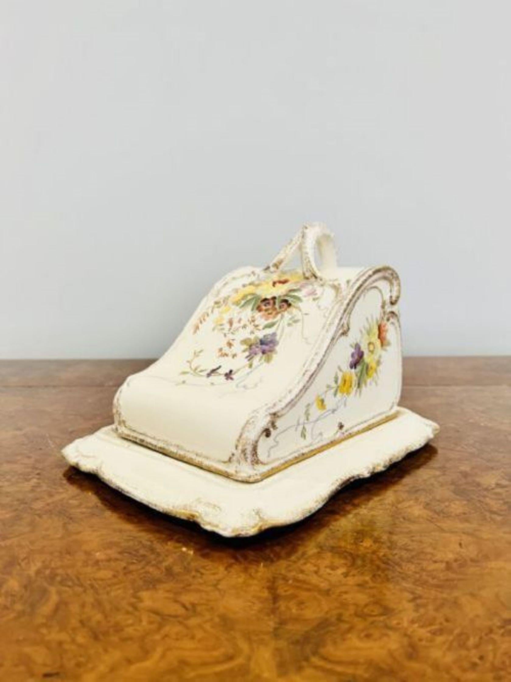 Quality antique cheese dish having hand painted floral decoration in wonderful yellow, green, orange, purple, gold and white colours with a shaped handle to the top with the original base
