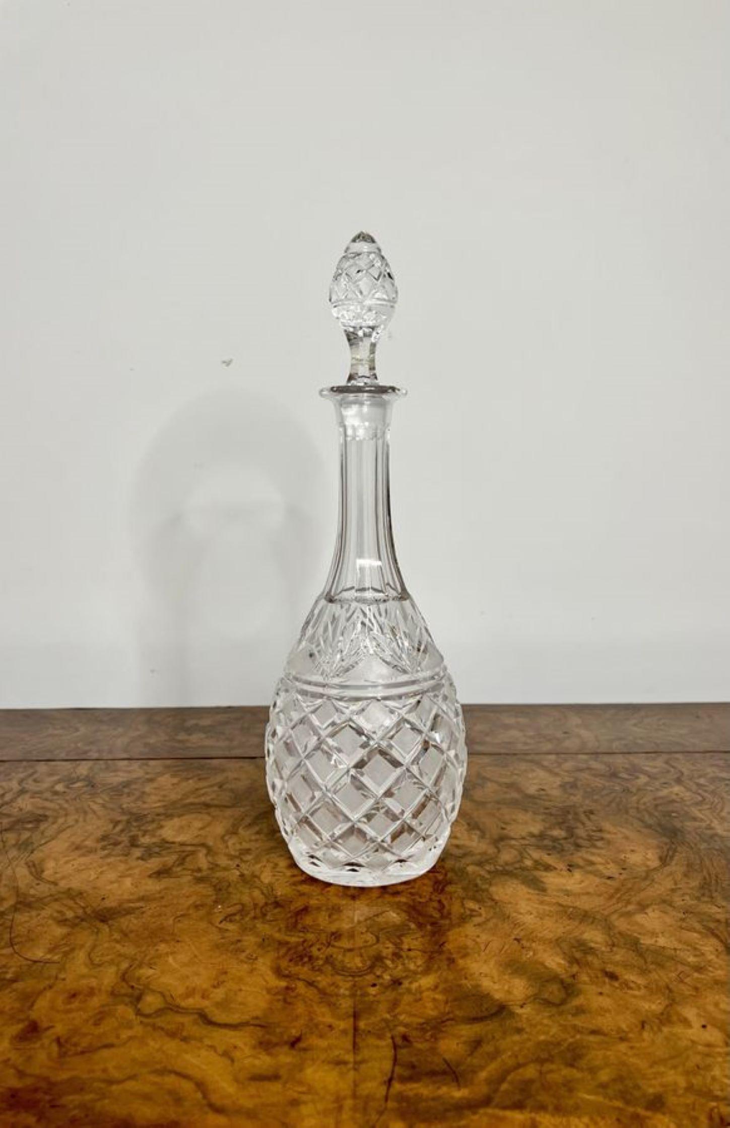 Quality antique cut glass decanter. Having a pear shaped quality cut glass decanter with the original cut glass stopper.

D.1900
