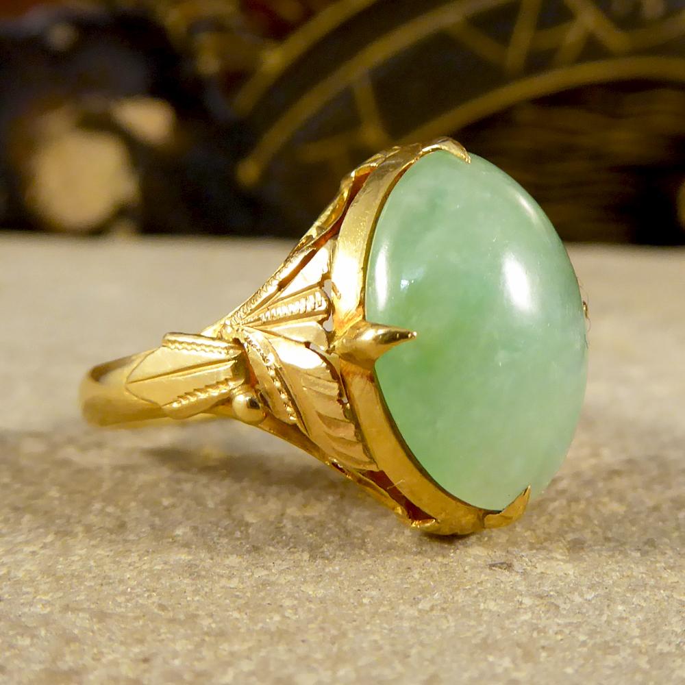 Featuring a beautiful oval shaped Jade stone, this gorgeous antique ring has been hand crafted in the Victorian era. Tested as 22ct Yellow Gold and crafted with exquisite detailing in the setting, this ring has very clear Chinese marks on the inner