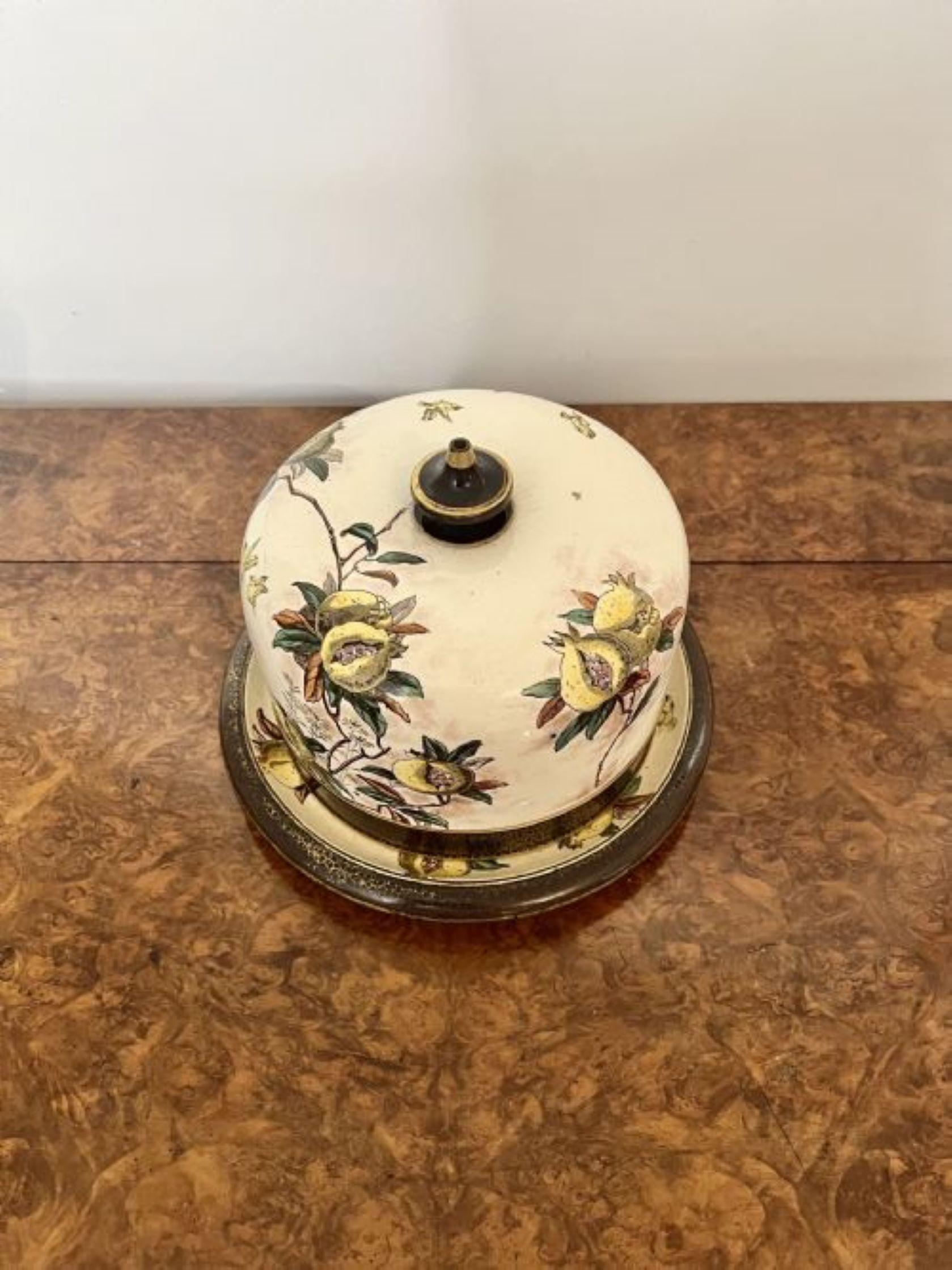 Quality antique Doulton Burslem cheese dish having a quality Doulton Burslem cheese dish and cover with hand painted flowers and birds in wonderful yellow, green, orange, blue and gold colours.