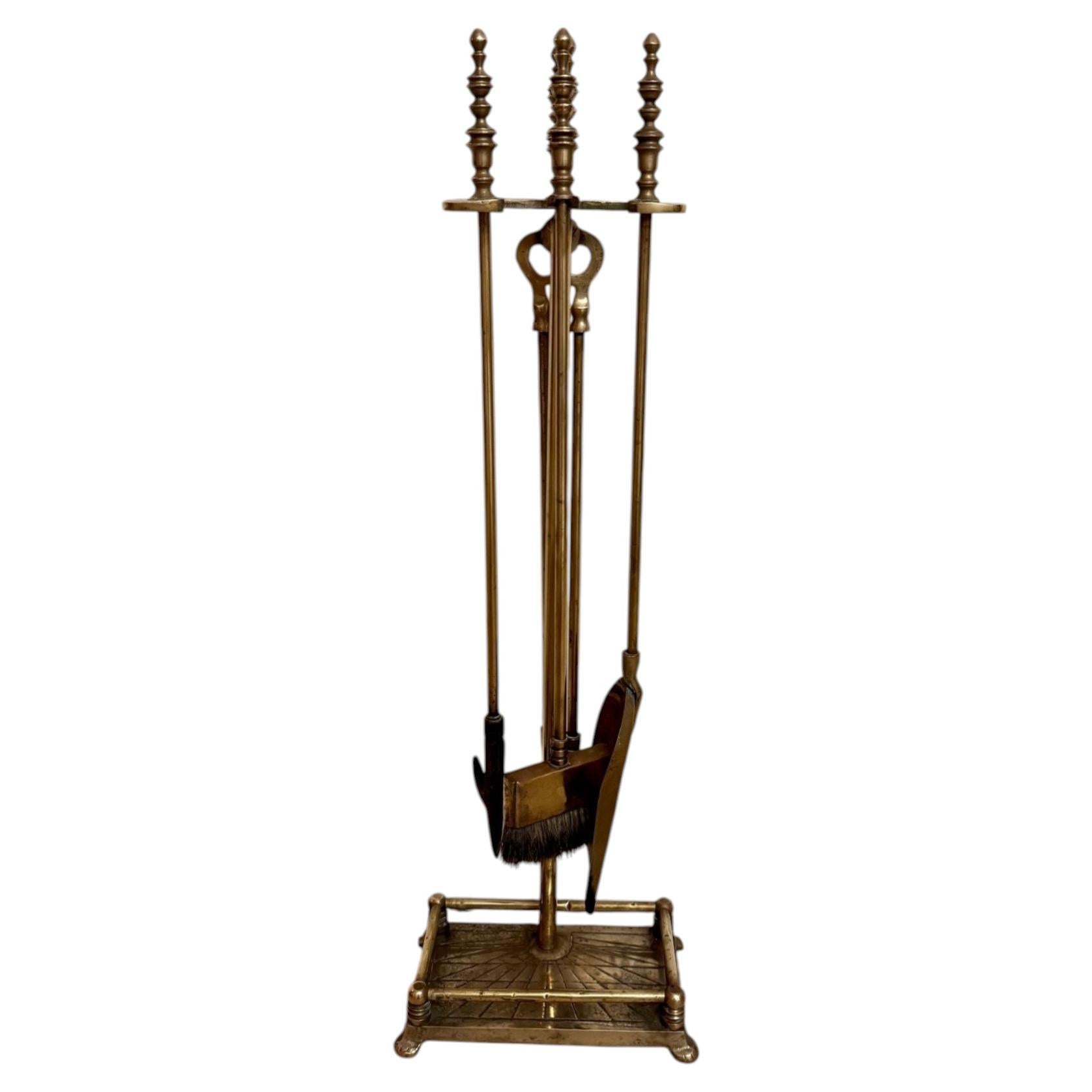 Quality antique Edwardian brass companion set