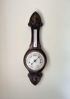 Quality antique Edwardian carved oak aneroid barometer