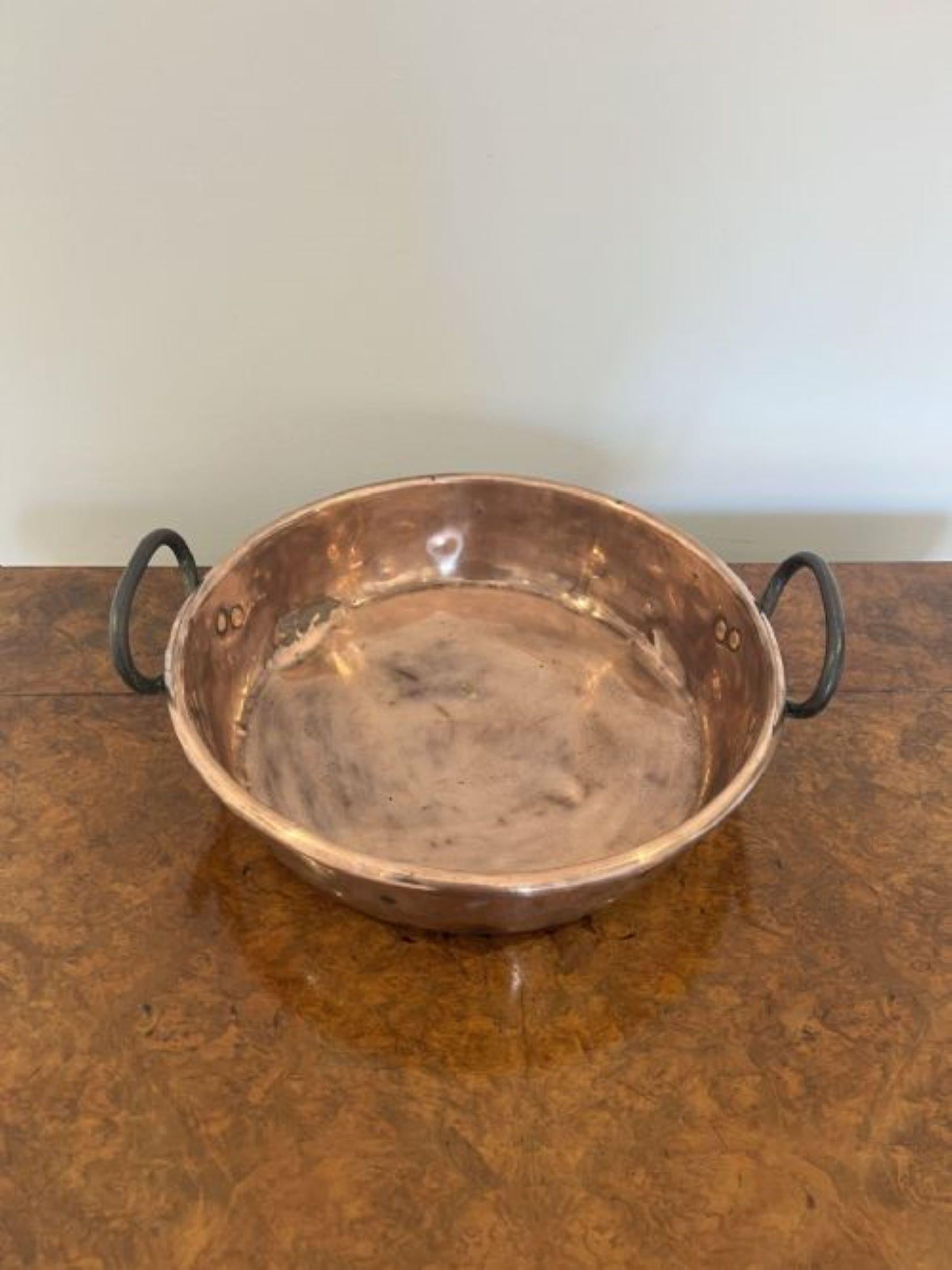 Quality antique George III large copper pan having a quality large antique George III copper pan with shaped handles to both sides. 
