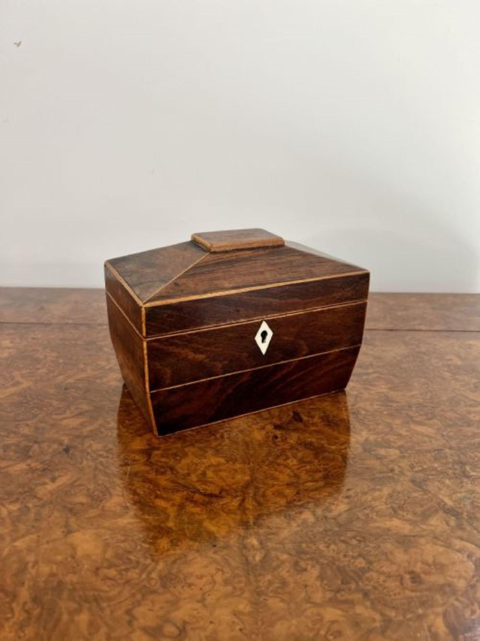 Quality antique George III mahogany tea caddy having a quality antique George III mahogany tea caddy with satinwood stringing inlay, with a lift up lid opening to reveal two lidded receptacles for tea. 