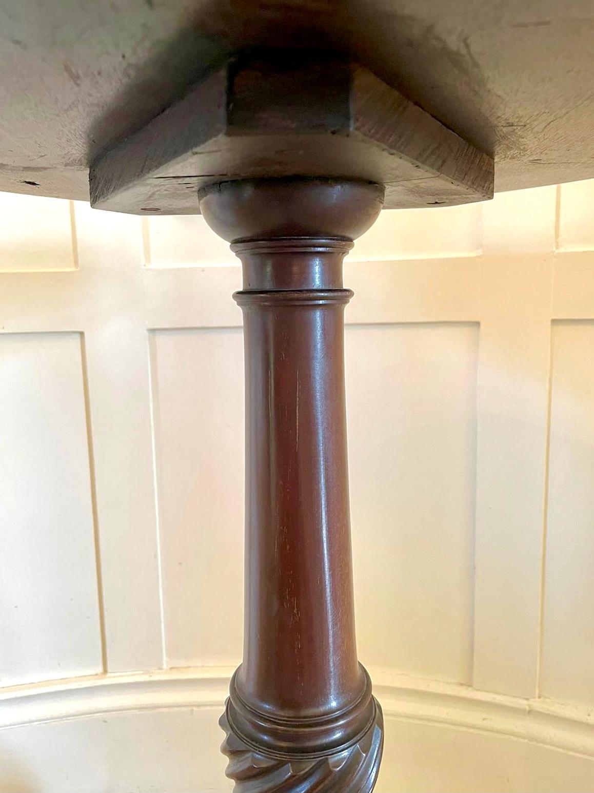 Quality antique George III mahogany wine table/kettle stand having a quality mahogany round top
raised on a lovely turned carved twisted column standing on expertly carved shaped cabriole legs with pad feet.

A very desirable piece in splendid