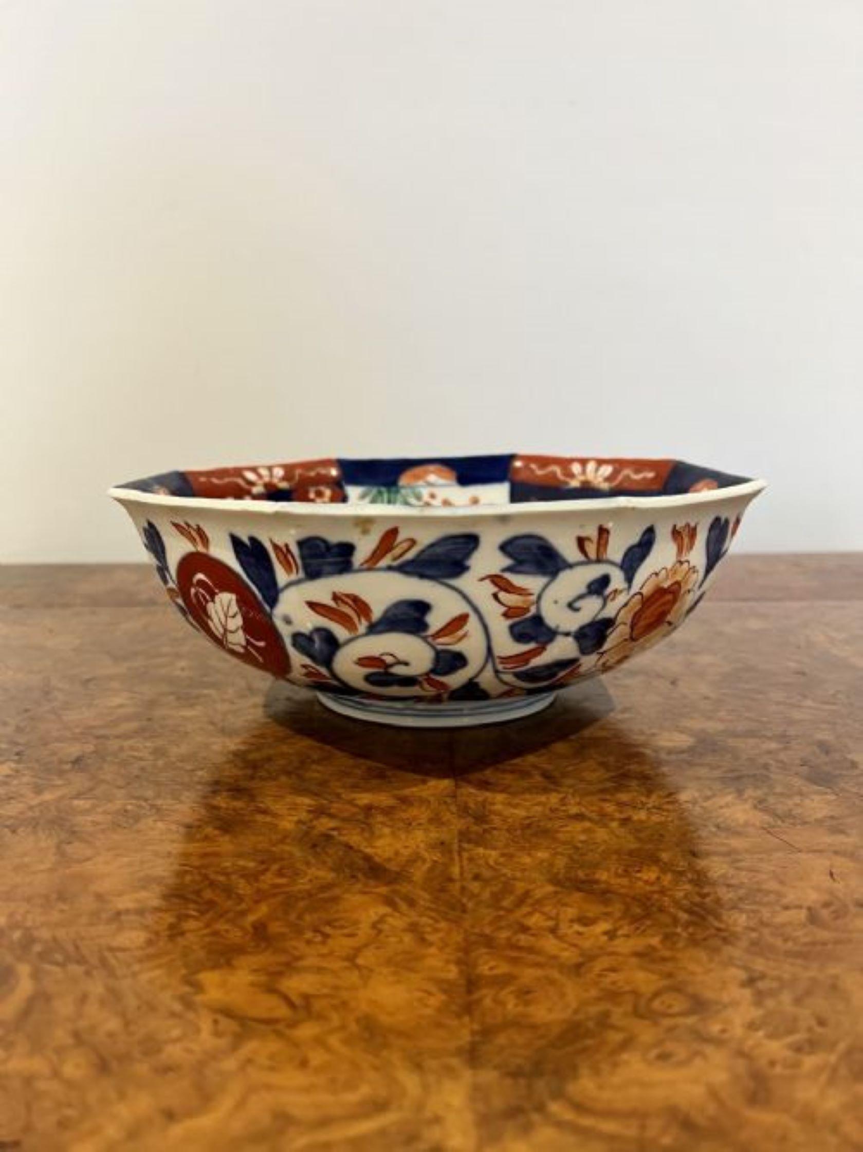 Quality antique Japanese hexagonal shaped imari bowl having having a quality antique Japanese hexagonal shaped imari bowl decorated with flowers, leaves and scrolls in wonderful hand painted red, blue, green and white colours. 