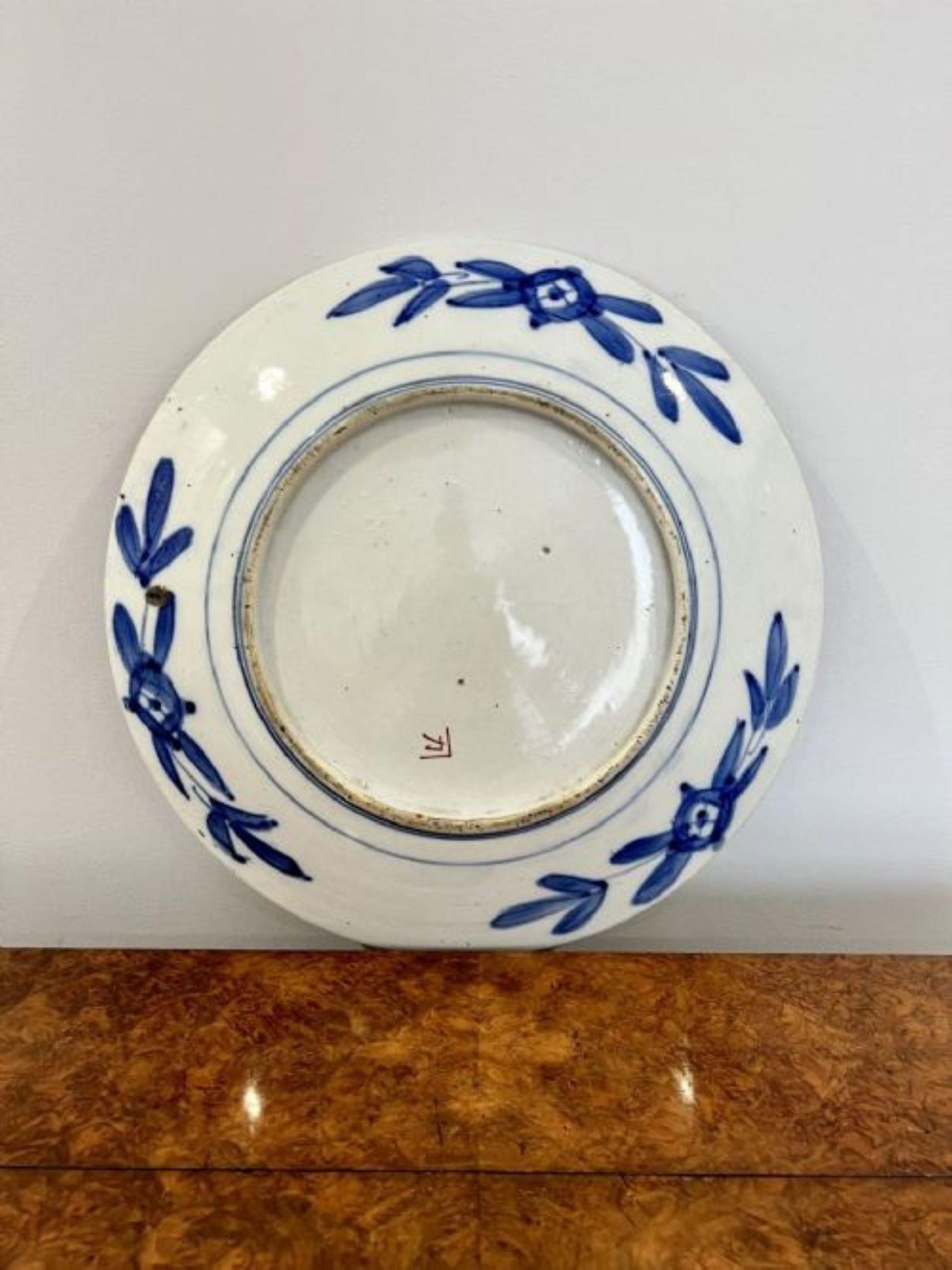 Quality antique Japanese Imari plate having a quality Imari charger with a central floral panel blue and red outer panels decorated with flowers and birds hand painted in wonderful red, orange, blue, green, yellow and gold colours 