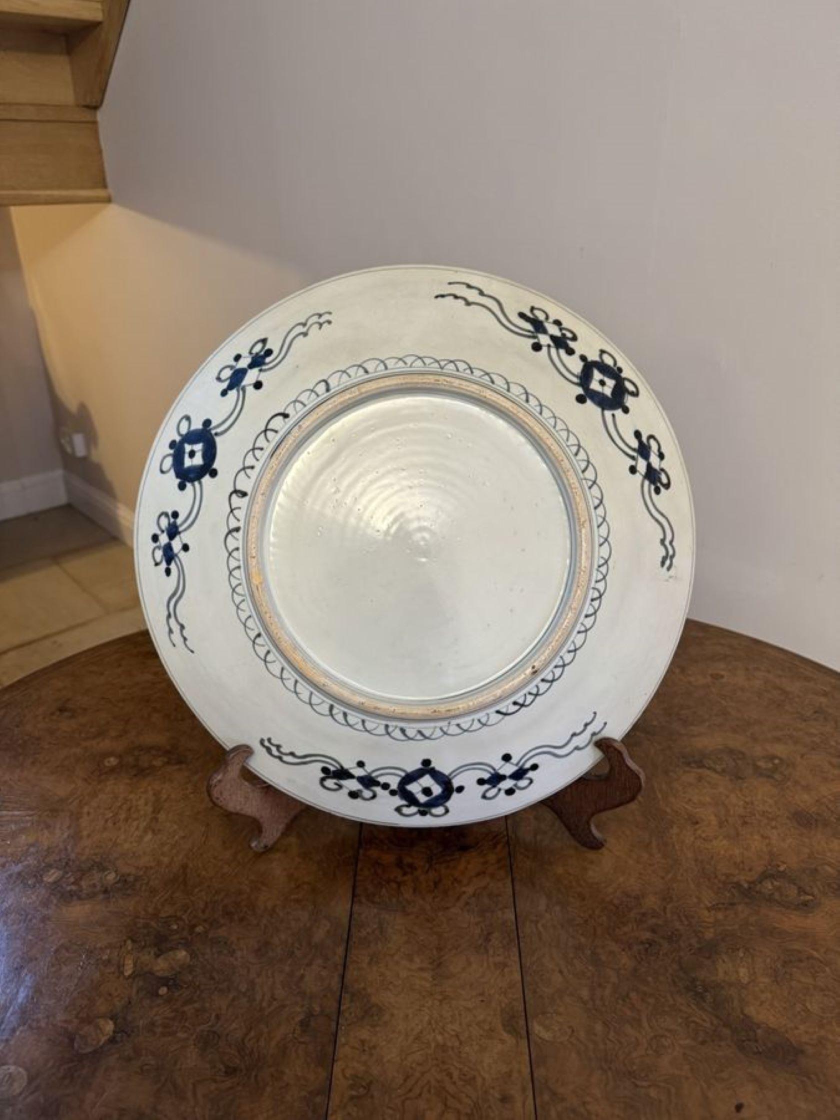 Quality antique Japanese imari charger having a quality antique Japanese imari charger decorated with flowers, trees, dragons and birds in vibrant red, blue, green, gold and white colours.

D. 1900
