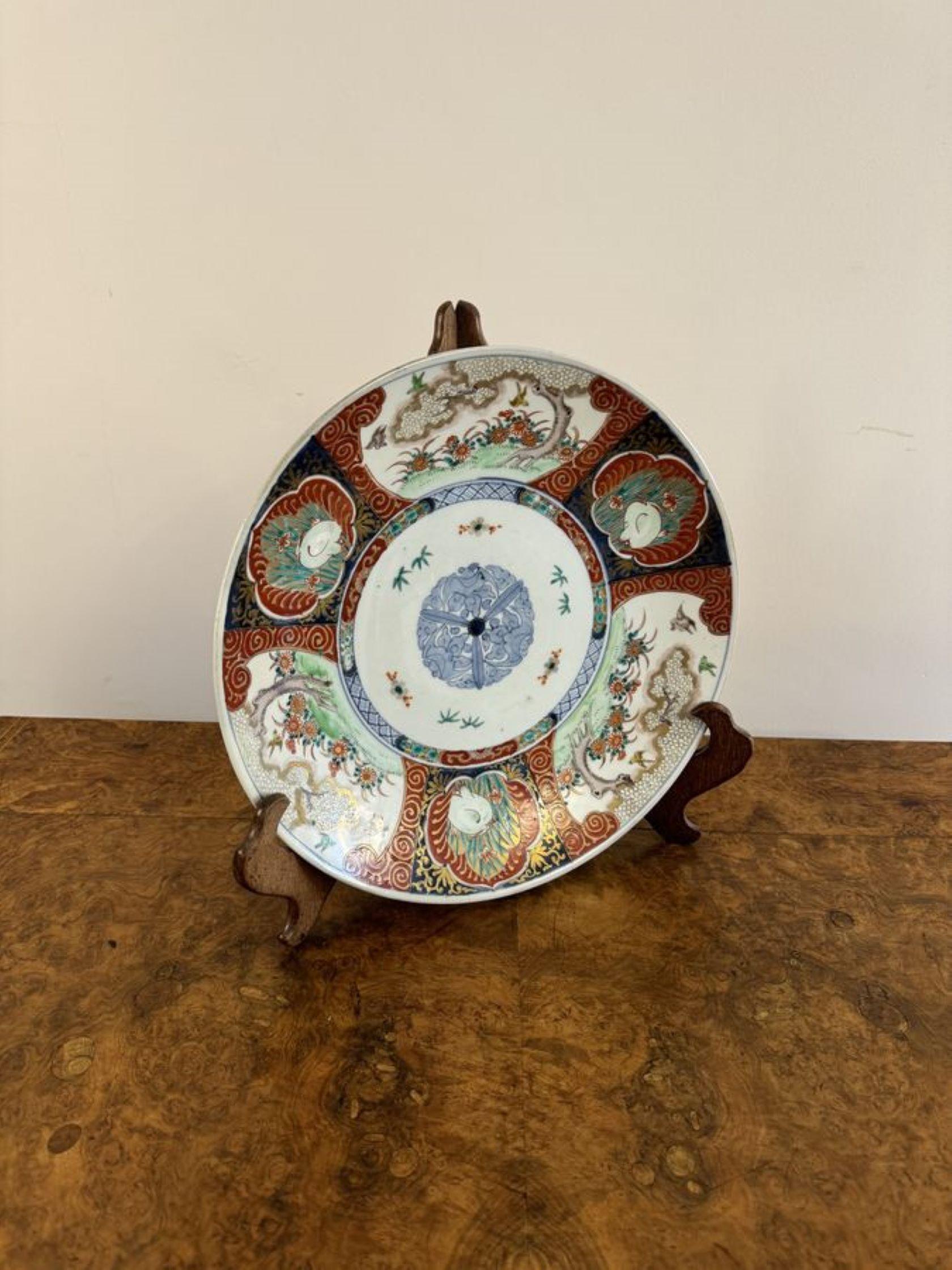 Quality antique Japanese imari plate, having a quality antique Japanese imari plate decorated with flowers, trees, birds and scrolls hand painted in wonderful red, green blue, white and gold colours.

D. 1900