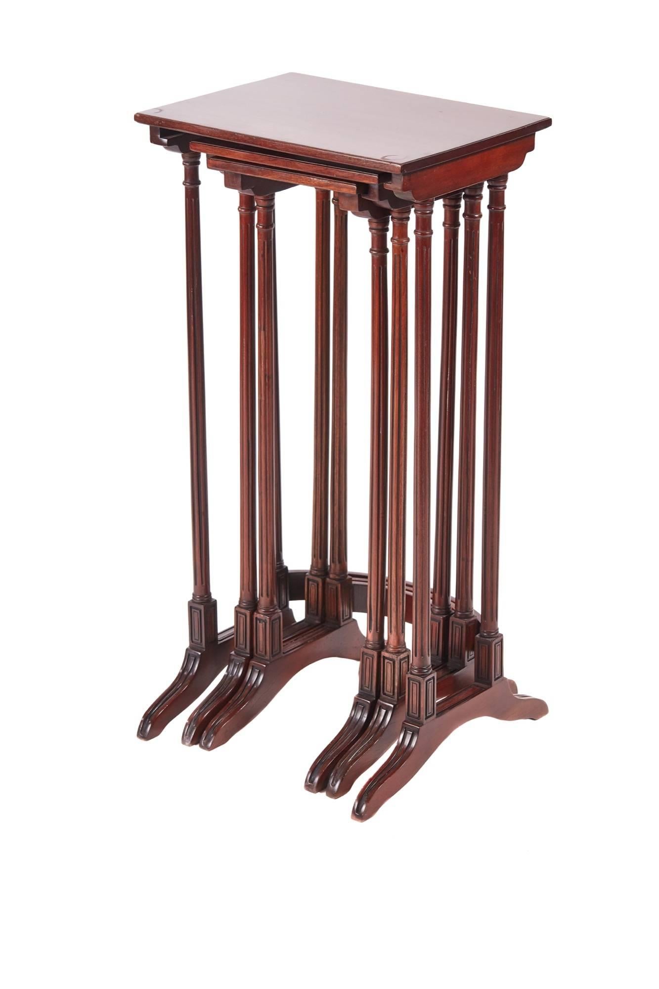 Quality antique mahogany nest of three tables, with lovely mahogany tops, supported on lovely elegant reeded turned columns, standing on lovely shaped reeded legs united by a shaped stretcher.