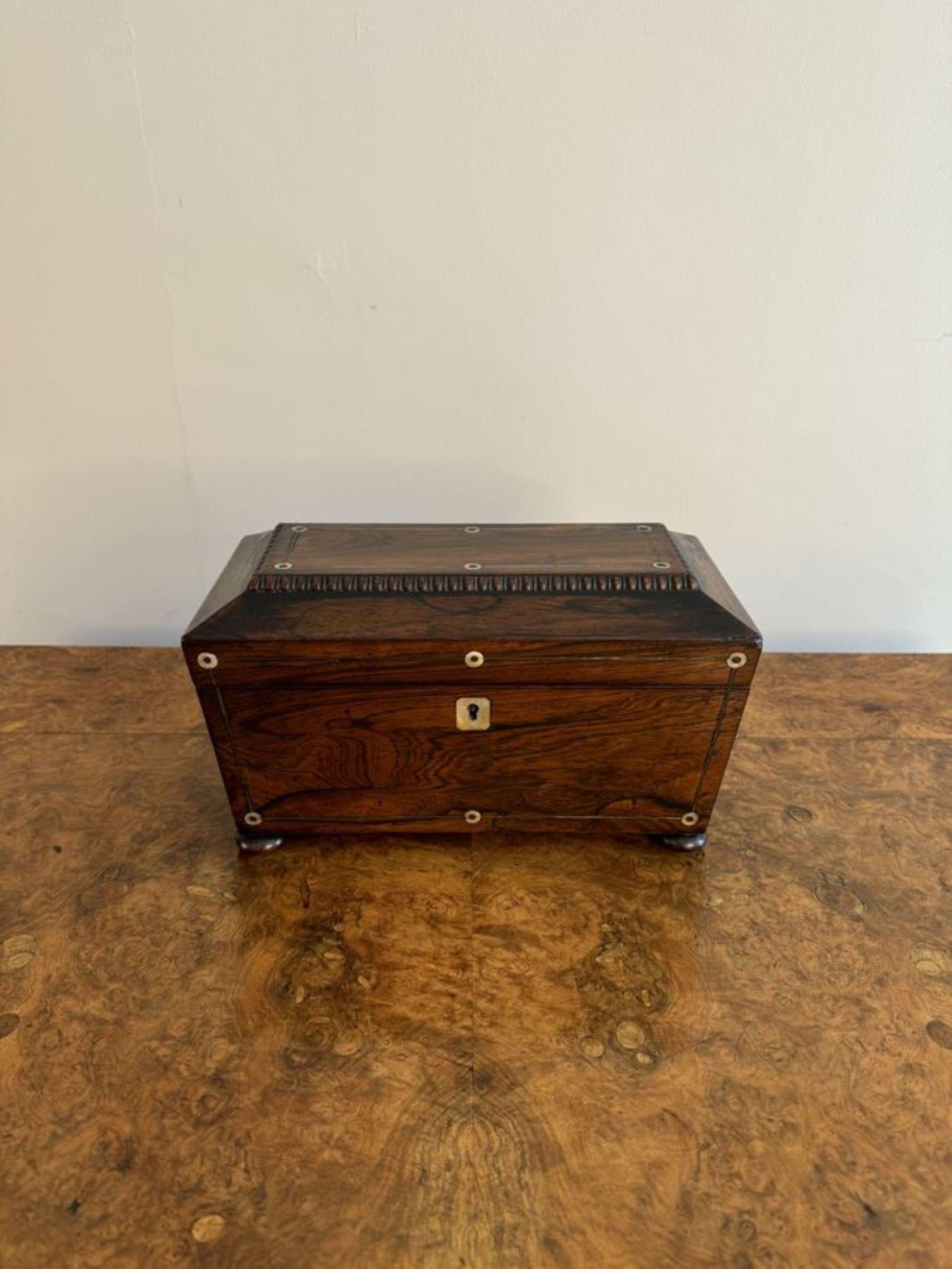 Quality antique Regency rosewood tea caddy having a quality antique Regency rosewood tea caddy with a quality carved moulded edge top opening to reveal a fitted interior with two lidded compartments for tea and a glass mixing bowl to the centre,