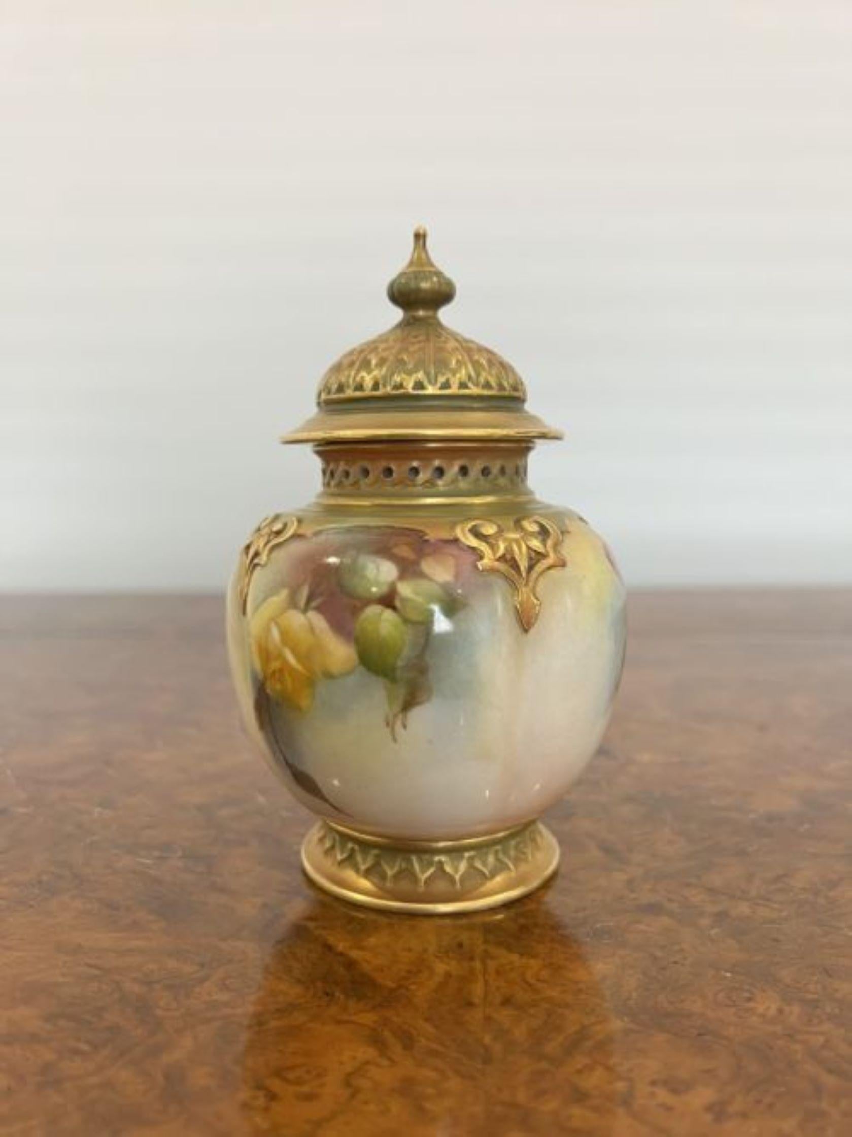 Quality antique Royal Worcester vase and cover having a moulded domed lid and gadrooned finial with a pierced rim above a moulded and scroll decorated body with wonderful puce and yellow rose decoration. Printed mark to the bottom and hand numbered 