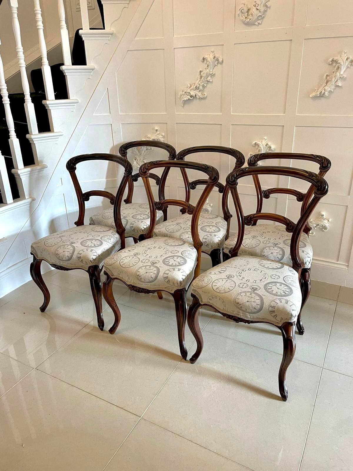 Quality antique set of 6 Victorian carved rosewood dining chairs having a delightful carved, shaped top rail, carved centre splat, newly reupholstered seats with a carved serpentine front rail, supported on elegant cabriole legs to the front out