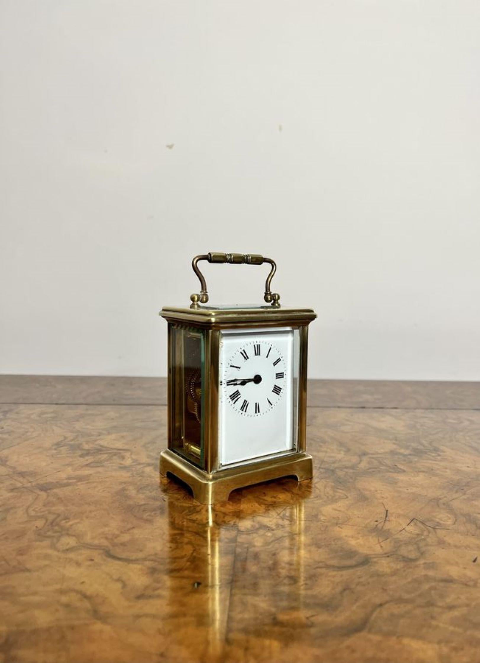 Quality antique Victorian brass carriage clock having a quality brass case with bevelled glass, white enamel dial with the original hands, eight day French movement and a handle to the top of the case. 

D. 1890