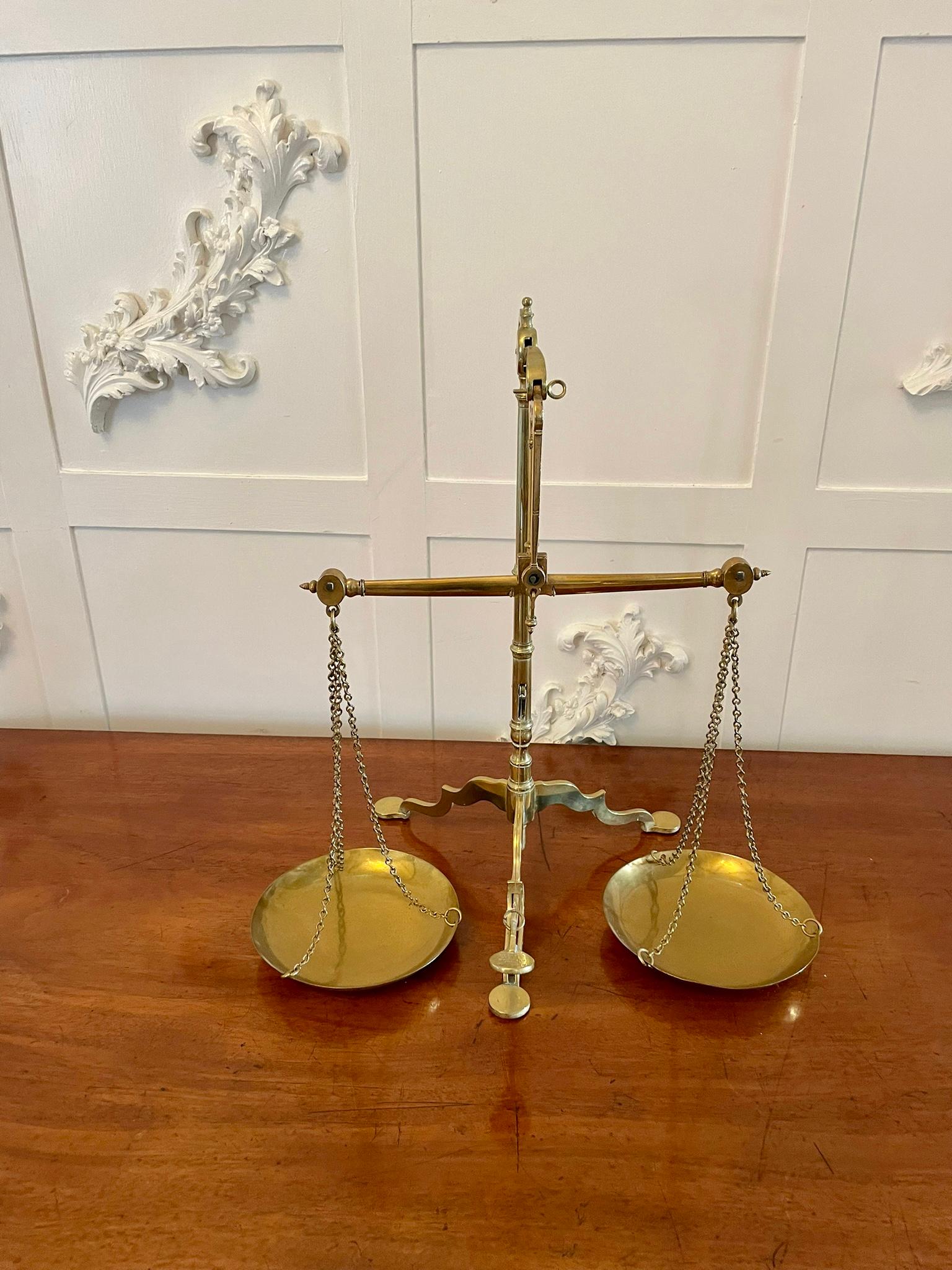 Quality antique Victorian brass scales having a quality set of brass scales with 2 circular brass pans standing on a brass tripod base

Quaint examples in lovely original condition

H 49.2 x W 49 x D 32cm
Date 1860

