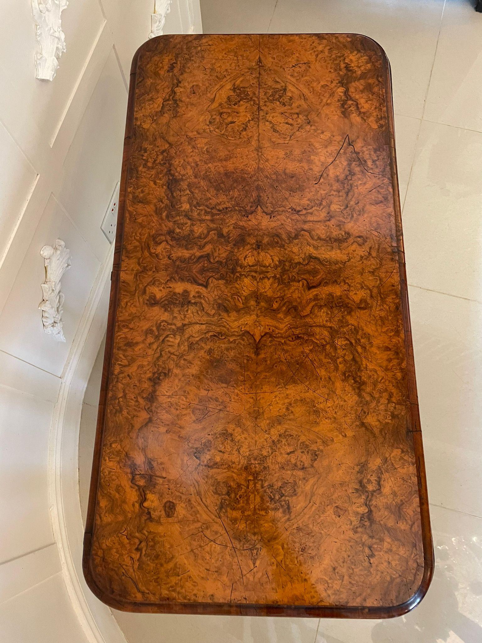 Quality antique Victorian burr walnut card/side table having a quality burr walnut top with a thumb moulded edge opening to reveal a baize interior. It is supported on shaped turned carved columns standing on shaped carved solid walnut cabriole legs