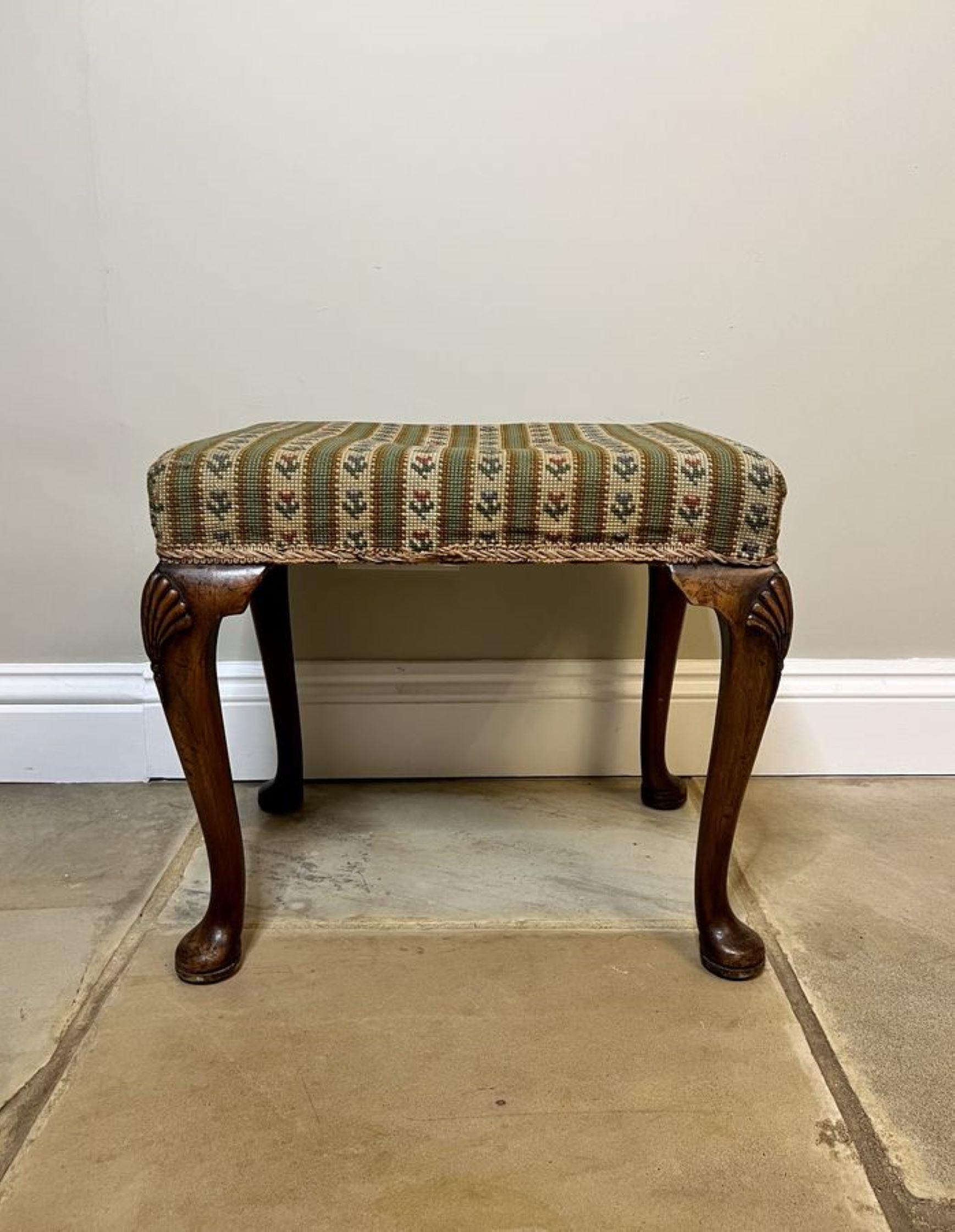 Quality antique Victorian carved walnut stool having a holstered seat supported by four quality carved walnut shaped cabriole legs with pad feet.

D. 1880