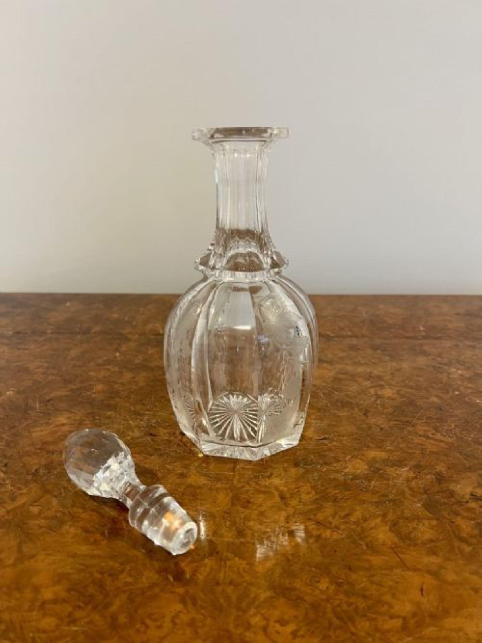 Quality antique victorian engraved decorated glass decanter having a quality antique Victorian decanter engraved with leaves and vines and a cut glass stopper 
Small chip to the neck as pictured