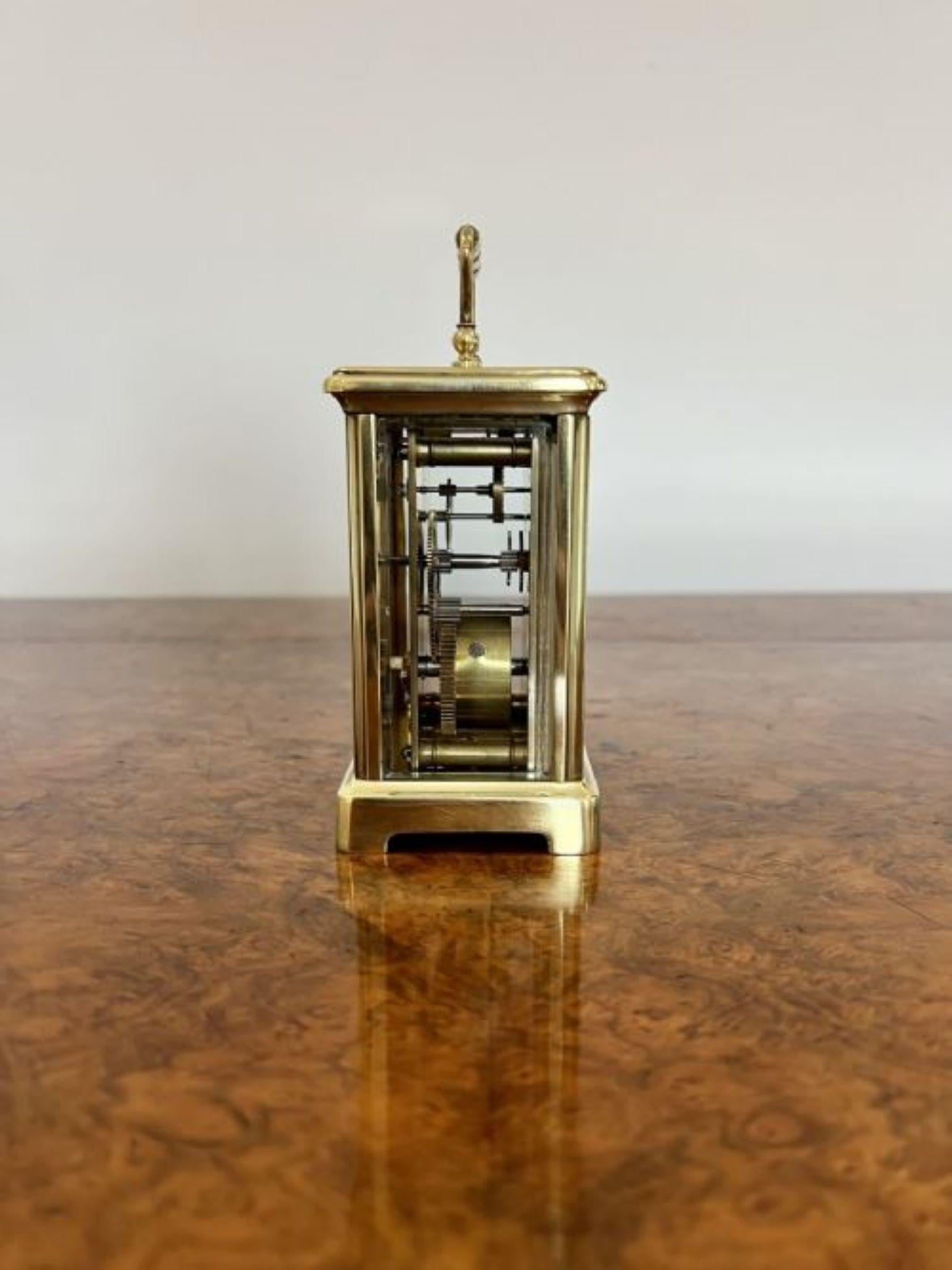 Quality antique Victorian French brass carriage clock having a quality brass case with bevelled glass, white enamel dial with original hands and key, eight day French movement and a handle to the top of the case. 
Please note all of our clocks are