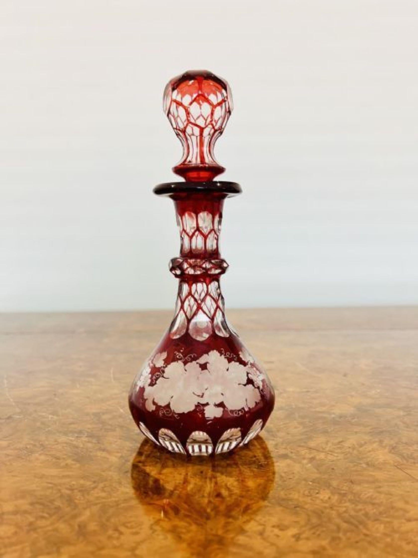 Quality antique Victorian glass spirit perfume bottle and stopper having a red and clear glass body with etched fruiting vine decoration 