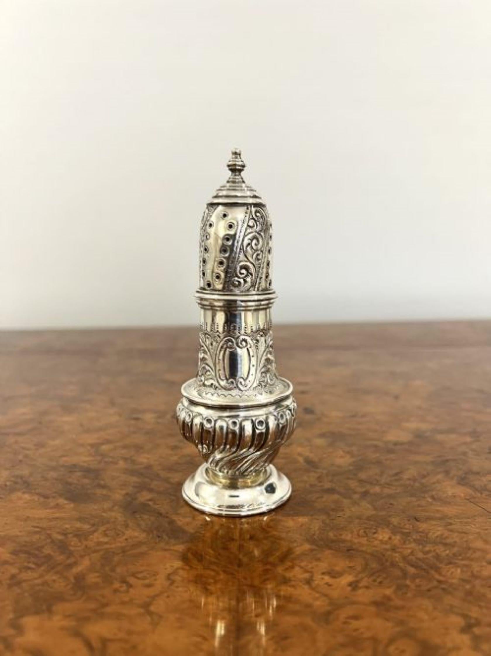 Quality antique Victorian hallmarked solid silver sugar sifter having a quality antique Victorian hallmarked solid silver sugar sifter with a pierced removable top, with detailed leaf and scroll design, part wrythen-fluted, EW, Chester 1895