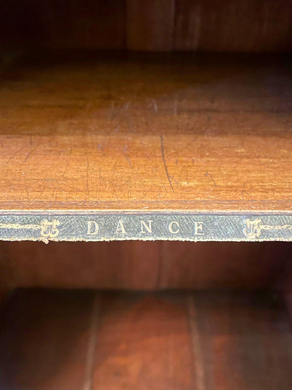 Quality antique Victorian inlaid burr walnut music cabinet having the original brass pierced gallery quality inlaid burr walnut top with a moulded edge above a single burr walnut glazed door opening to reveal a fitted interior of four shelves,