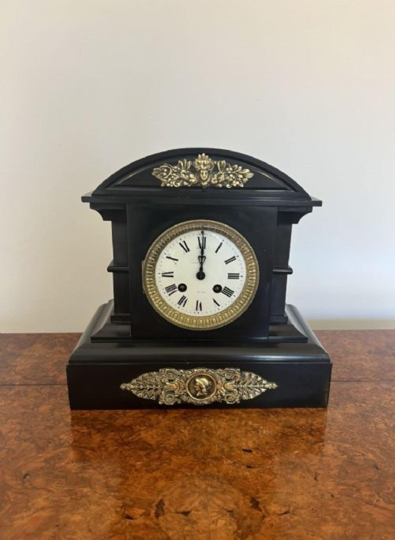 Quality antique Victorian marble and brass eight day striking mantle clock. Having a shaped arched top marble case with quality ornate brass mounts and bezel, porcelain dial with original hands eight day movement striking the hour and half hour on a