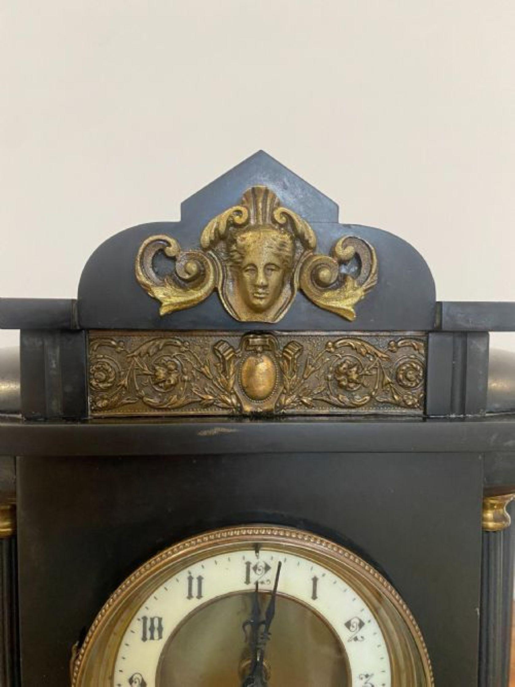 Quality antique Victorian marble mantle clock having black Roman numerals on a cream chapter ring, with a pavilion shaped case with six reeded columns on a stepped plinth base. Brass detail. Original hands and key
Please note all of our clocks are